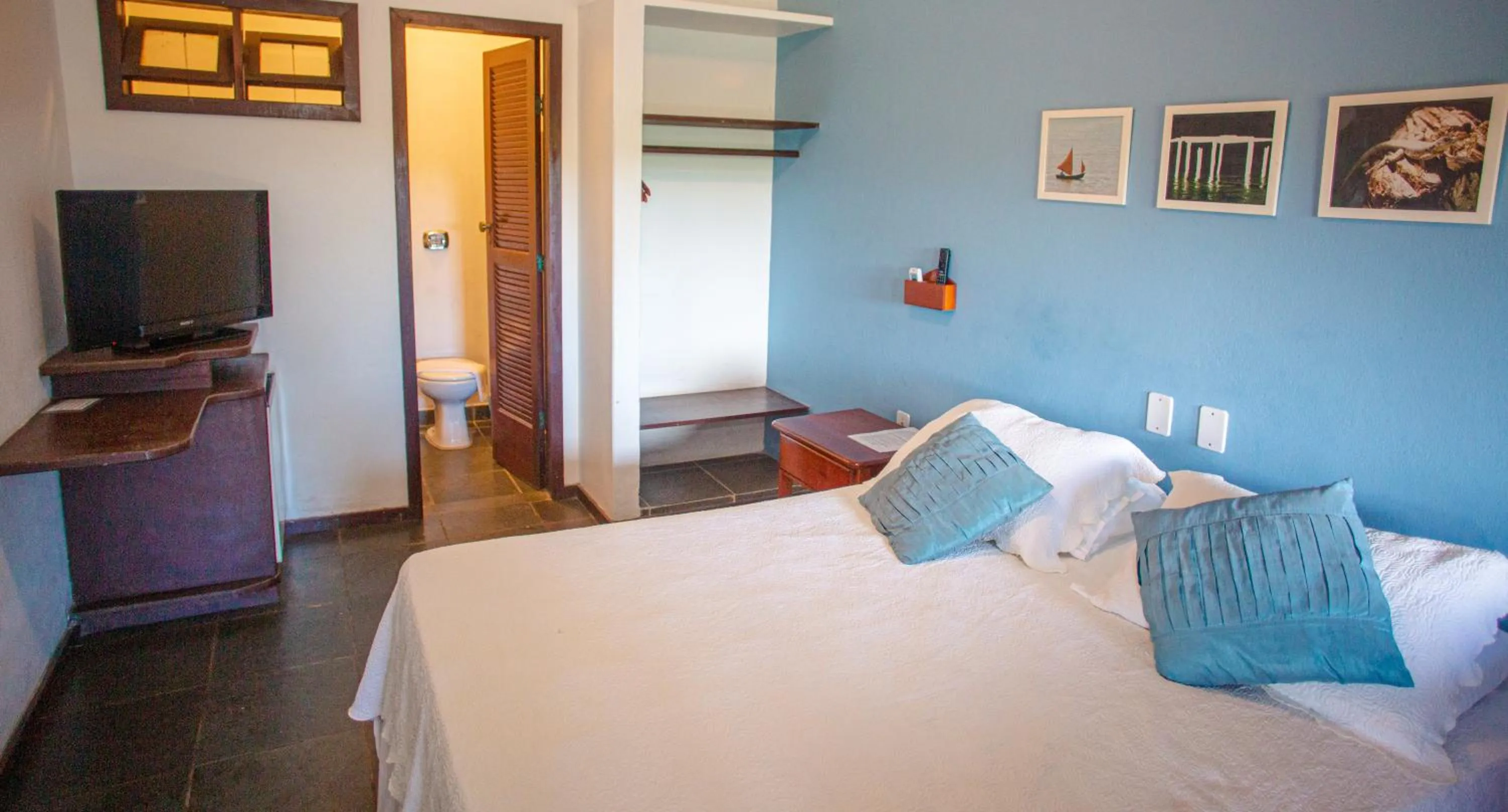 Bed in Pousada Canto do Rio