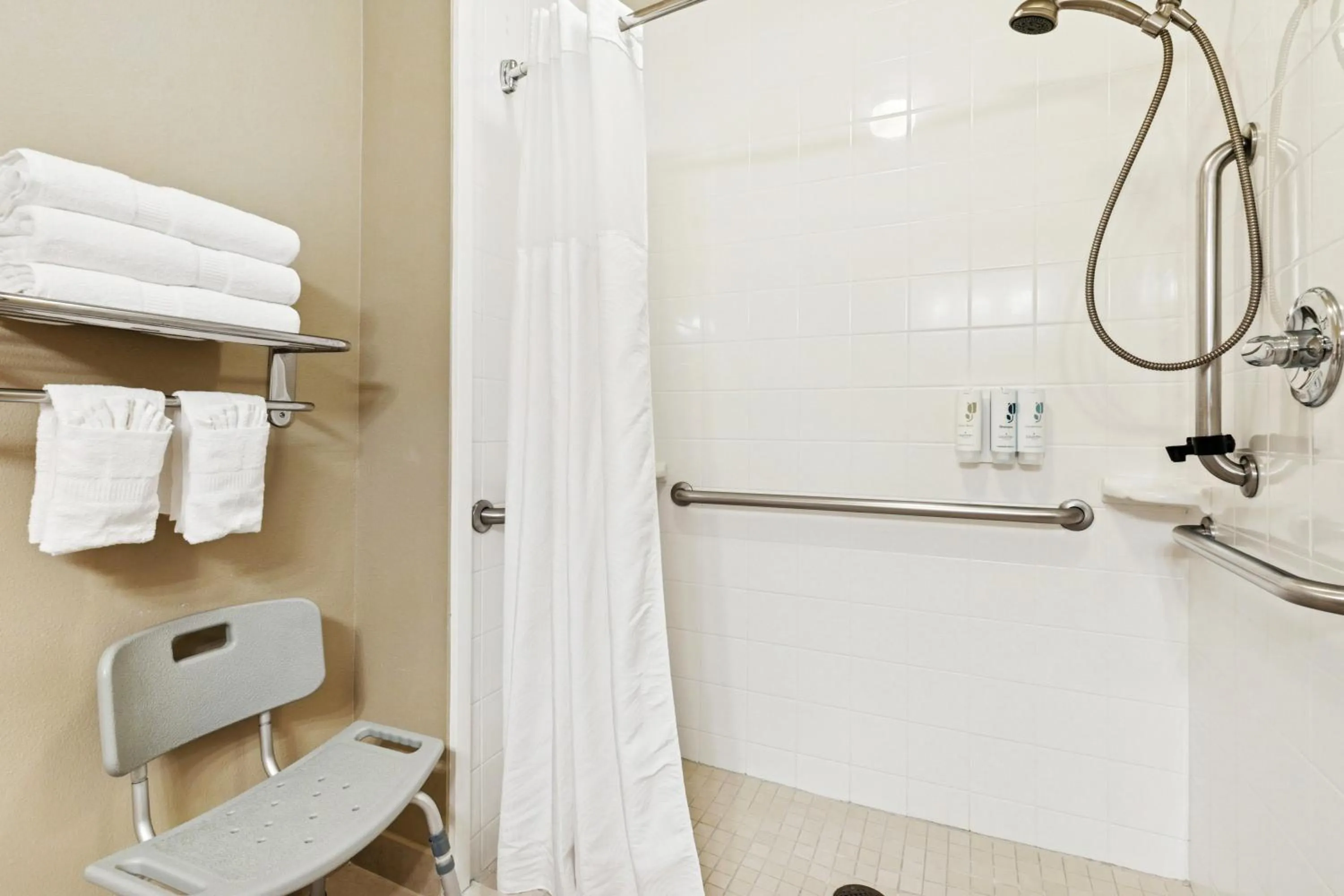 Shower in Country Inn & Suites by Radisson, Covington, LA