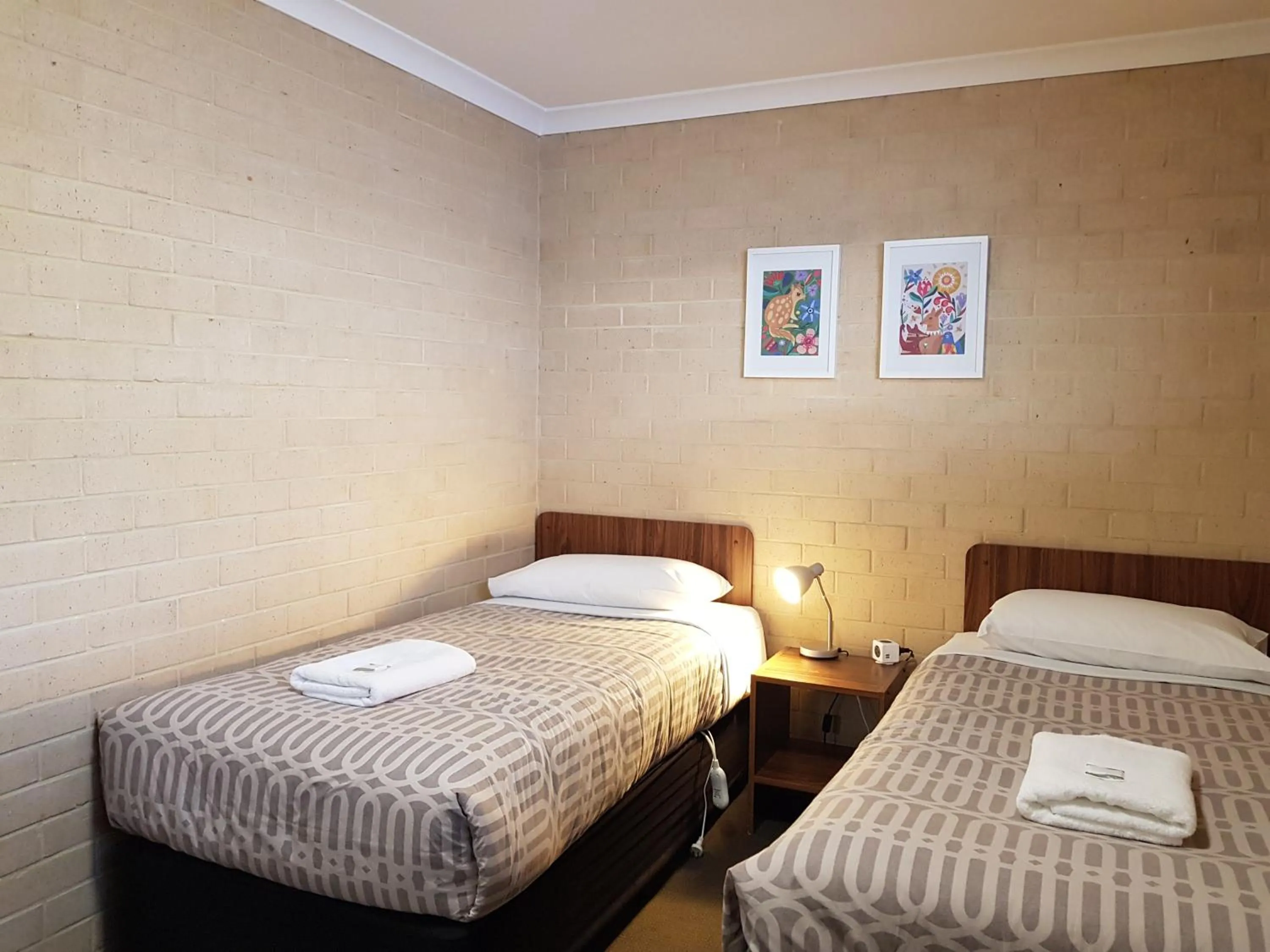 Bed in Albany Holiday Units