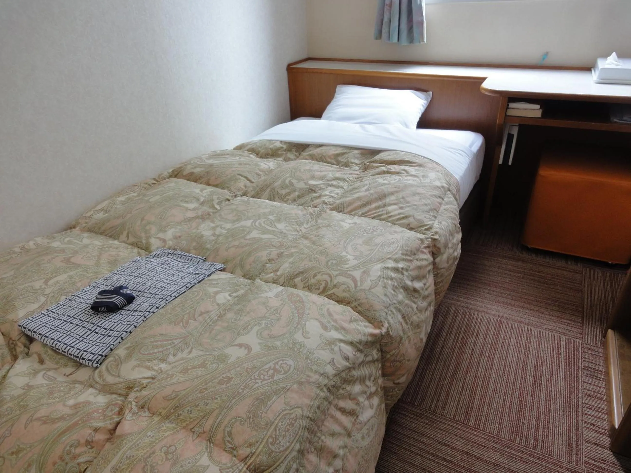 Bed in Matsue Plaza Hotel