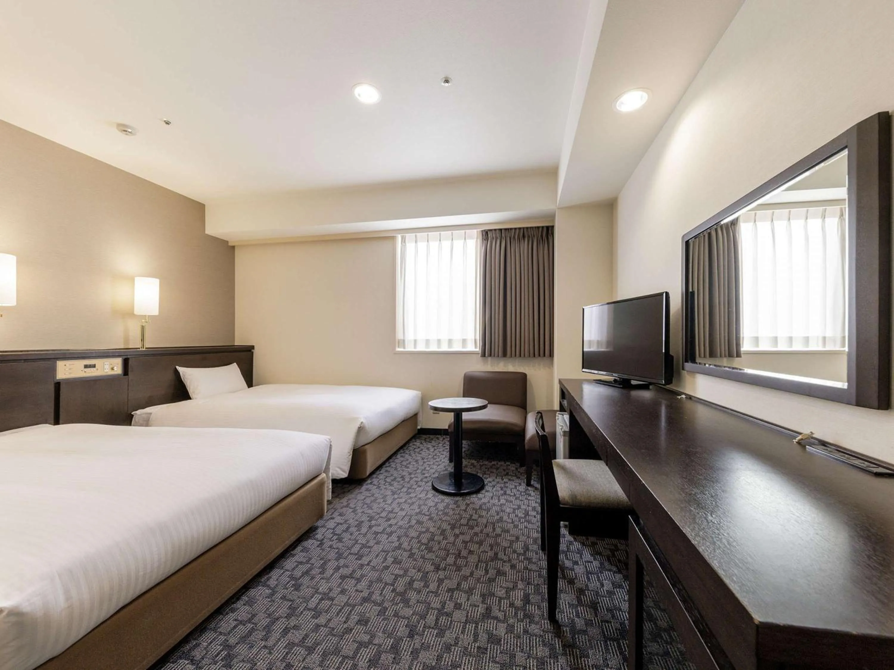 Bed in Nishitetsu Inn Kokura