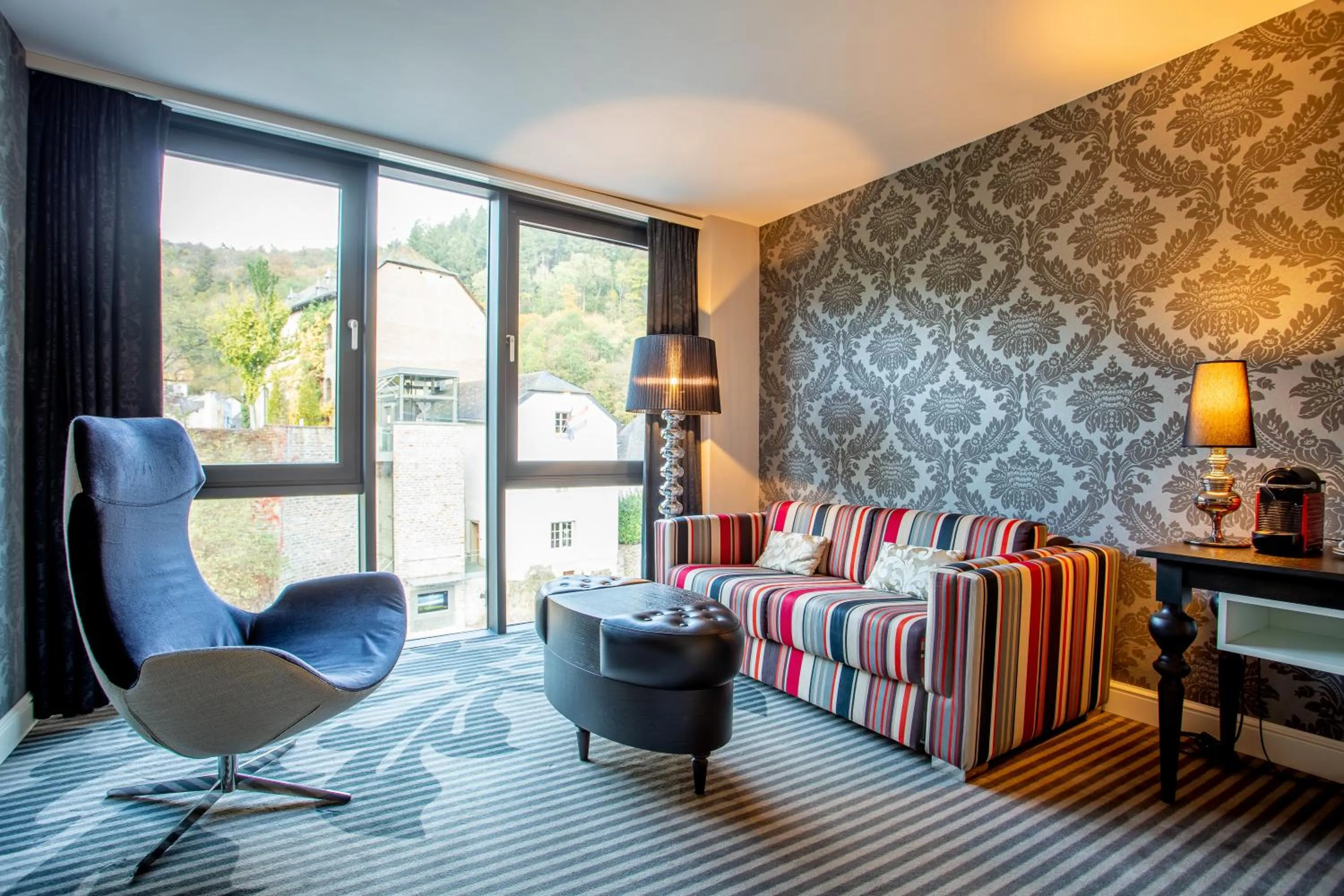 Living room, Bed in Le Clervaux Boutique Hotel & Spa