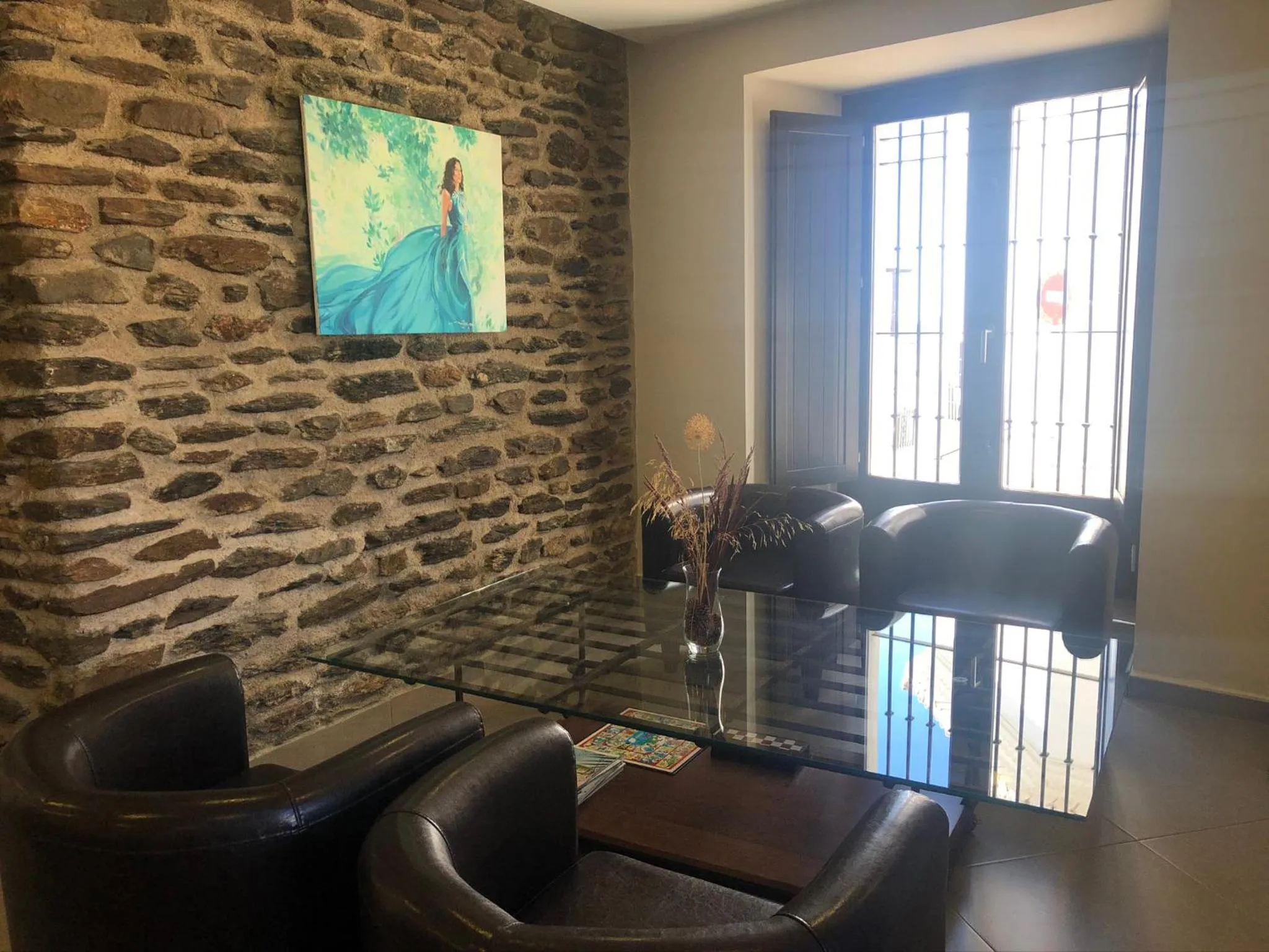 Communal lounge/ TV room in Hotel Rural Real de Poqueira