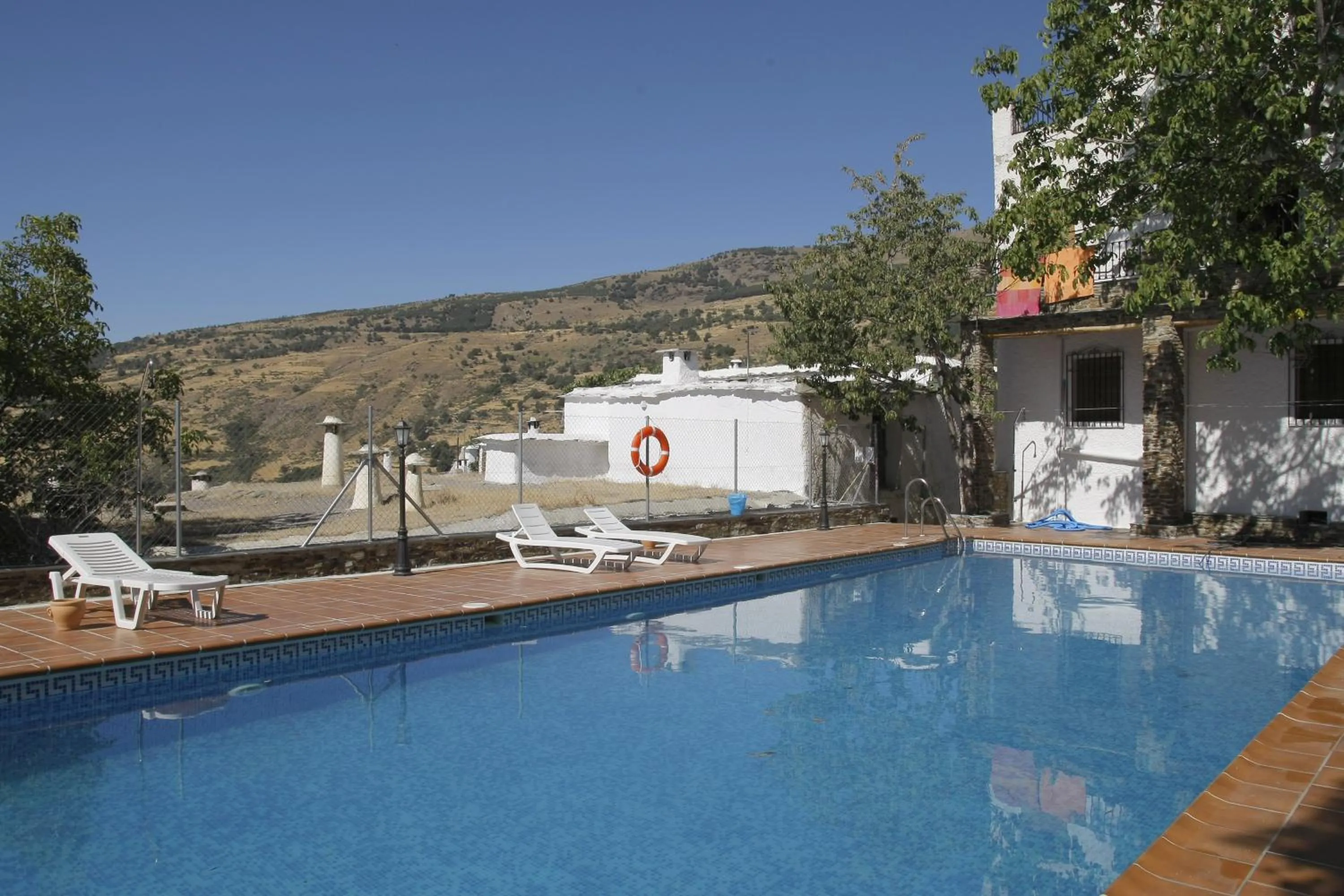 Swimming pool in Hotel Rural Real de Poqueira