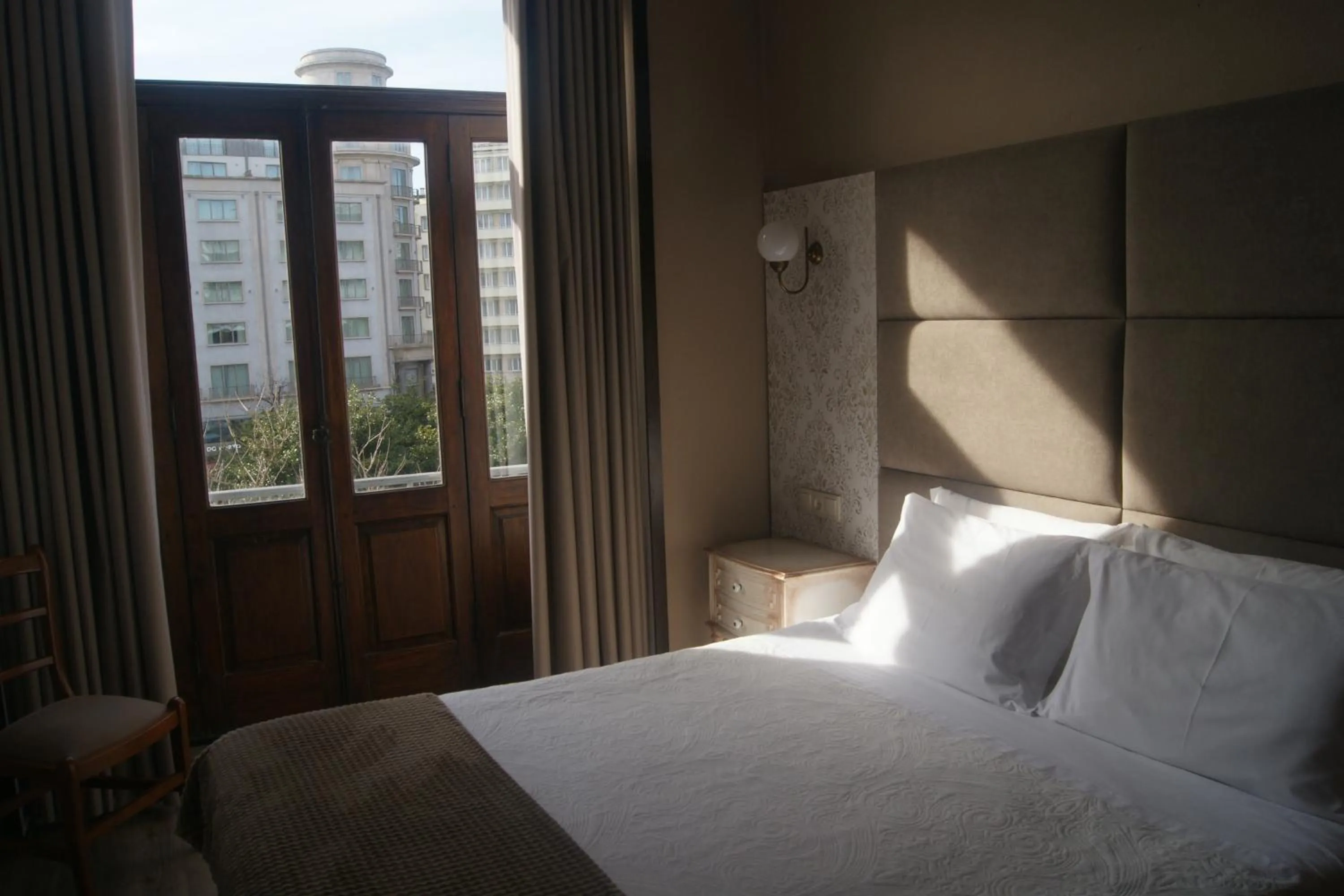 Bed in Hotel Chique Aliados