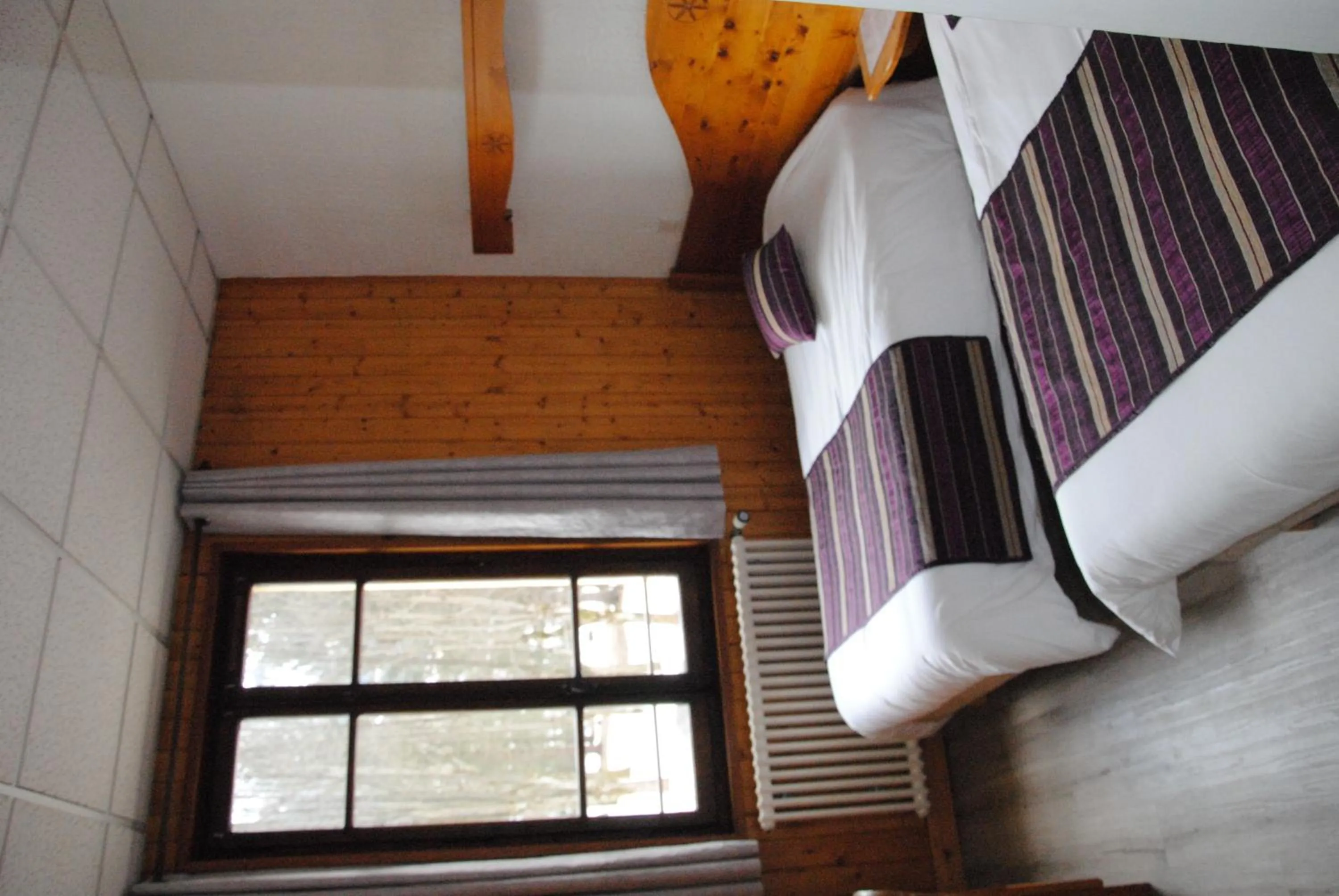 Bed in Hotel des Lacs