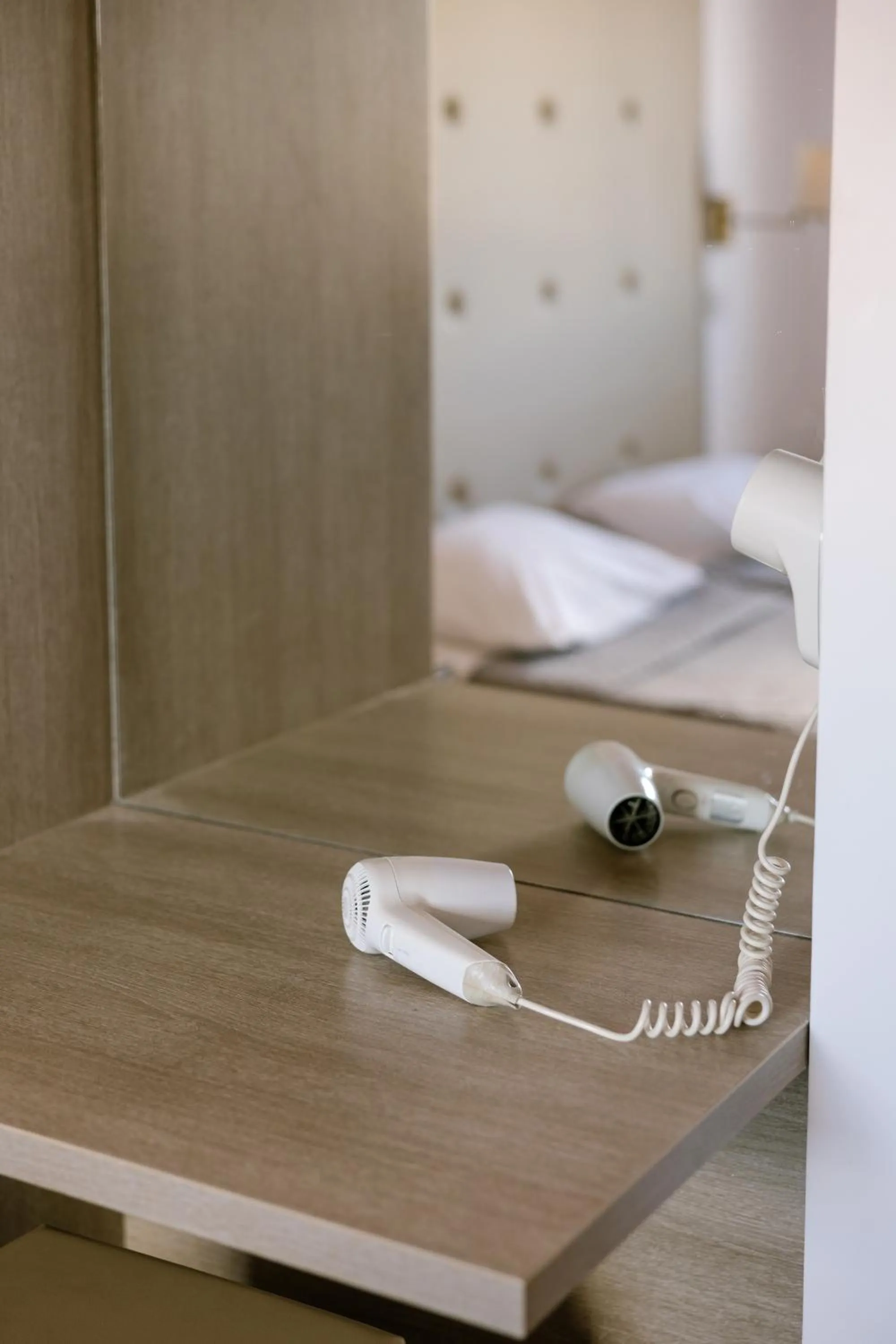 Bed in Neptune Hotel Apartments Paphos