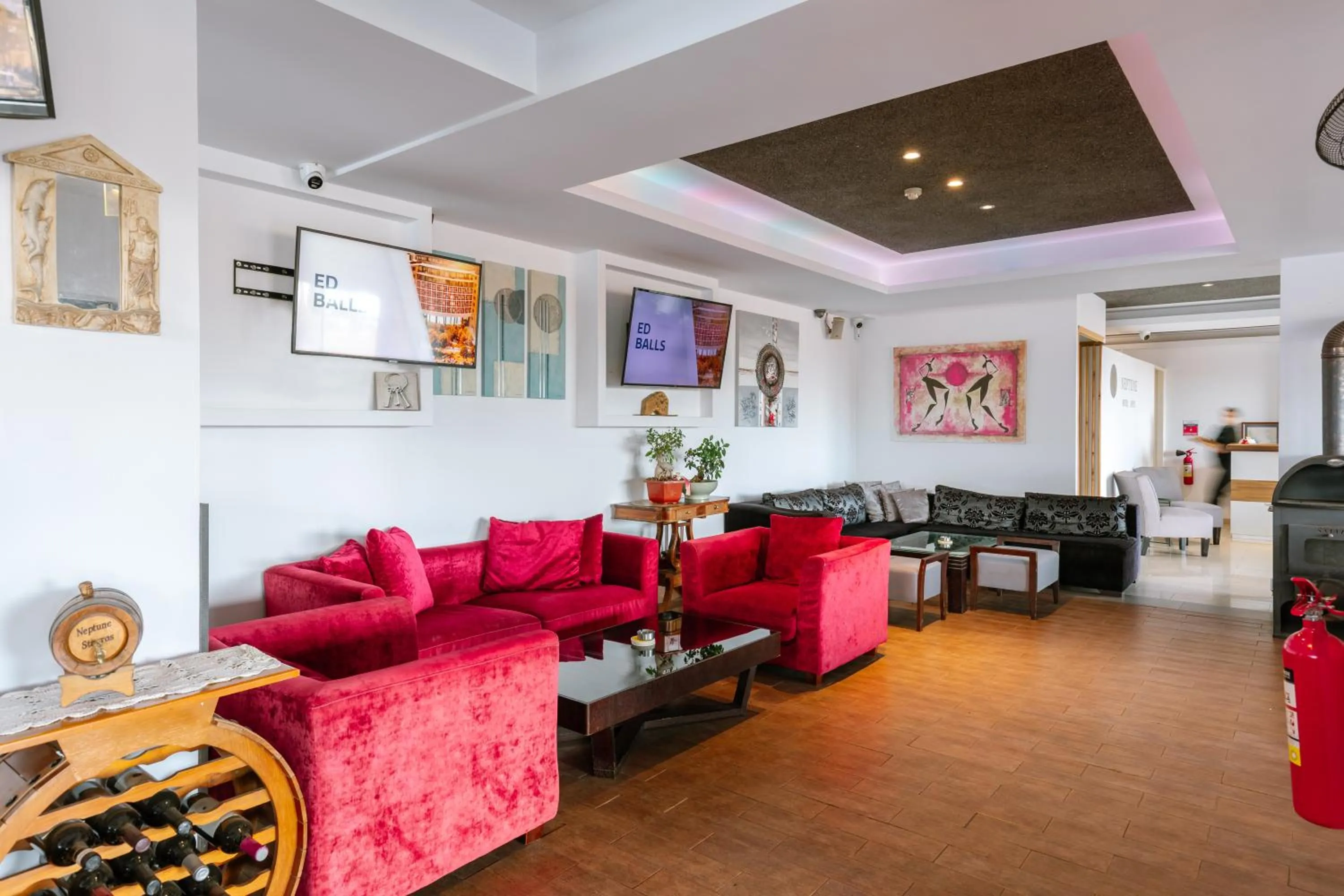 Communal lounge/ TV room in Neptune Hotel Apartments Paphos