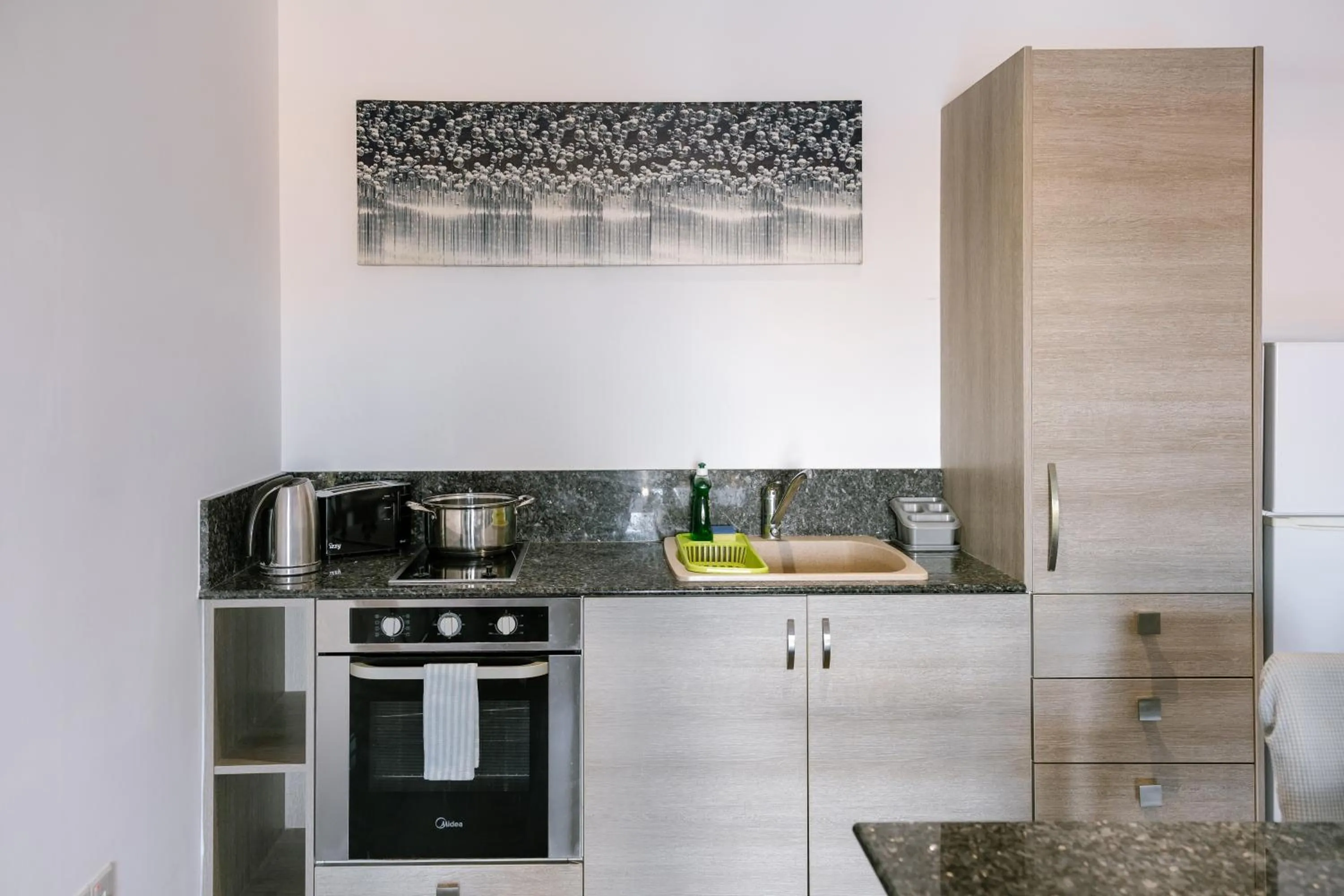 Kitchen or kitchenette in Neptune Hotel Apartments Paphos