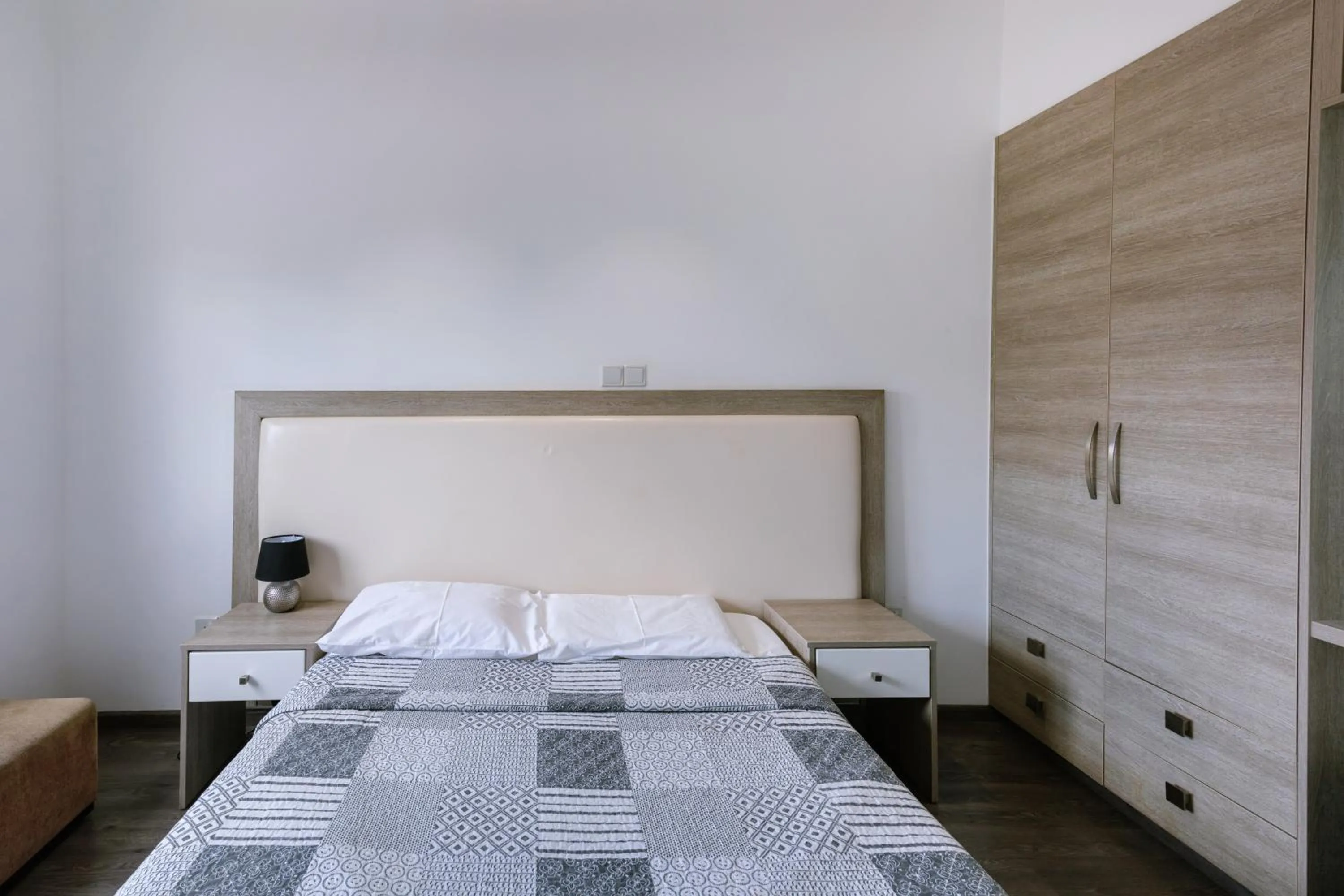 Bed in Neptune Hotel Apartments Paphos