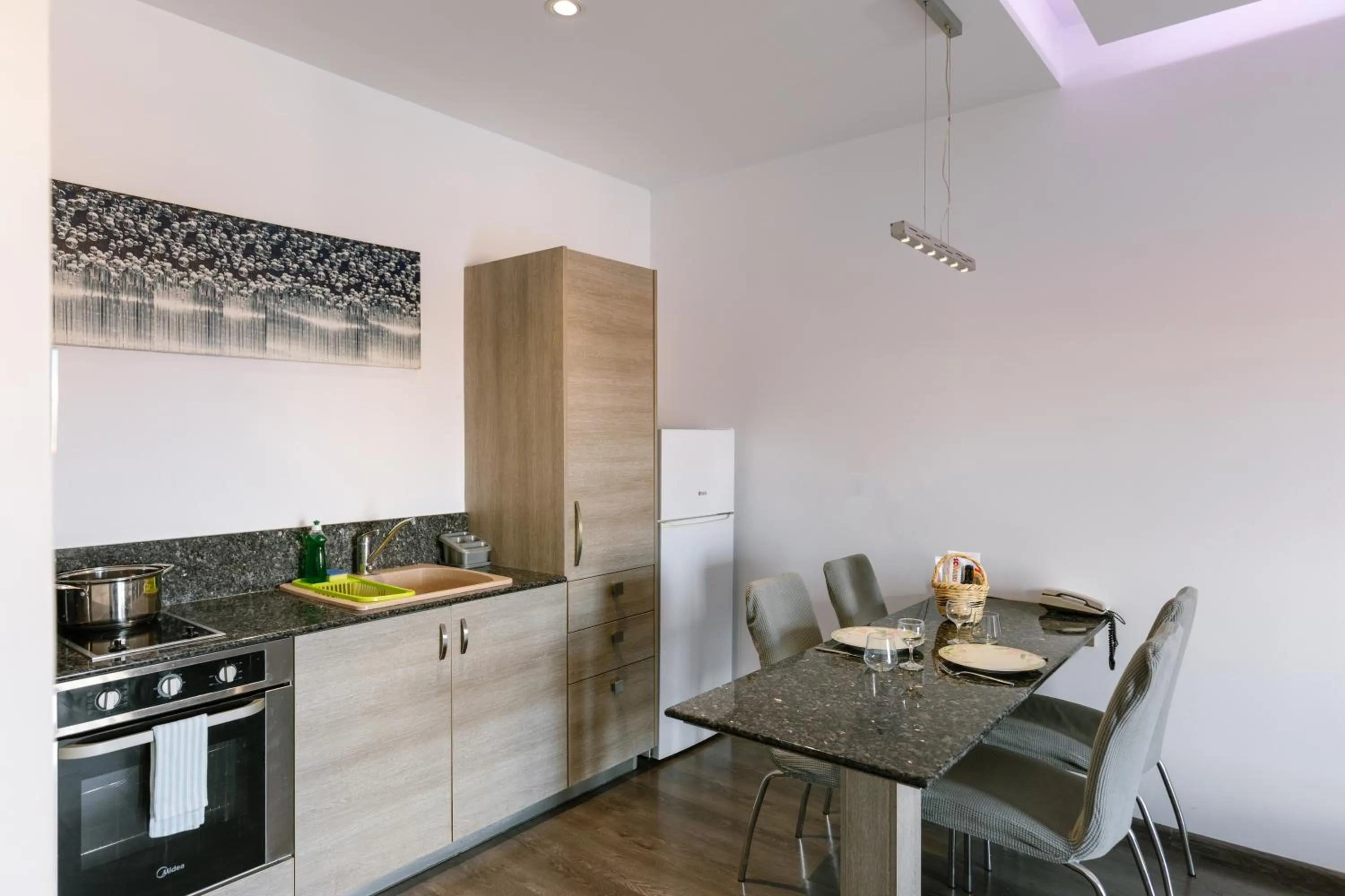 Kitchen or kitchenette in Neptune Hotel Apartments Paphos