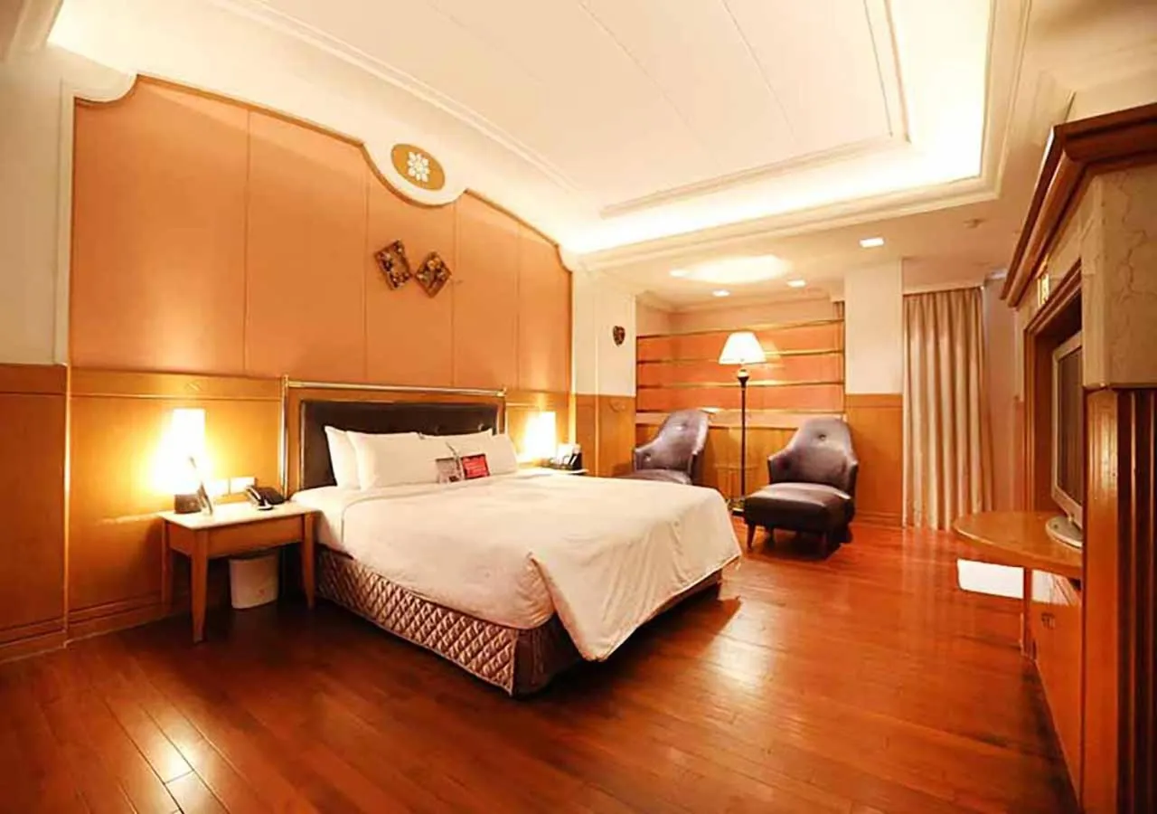 Bed in Royal Group Motel Tainan Branch