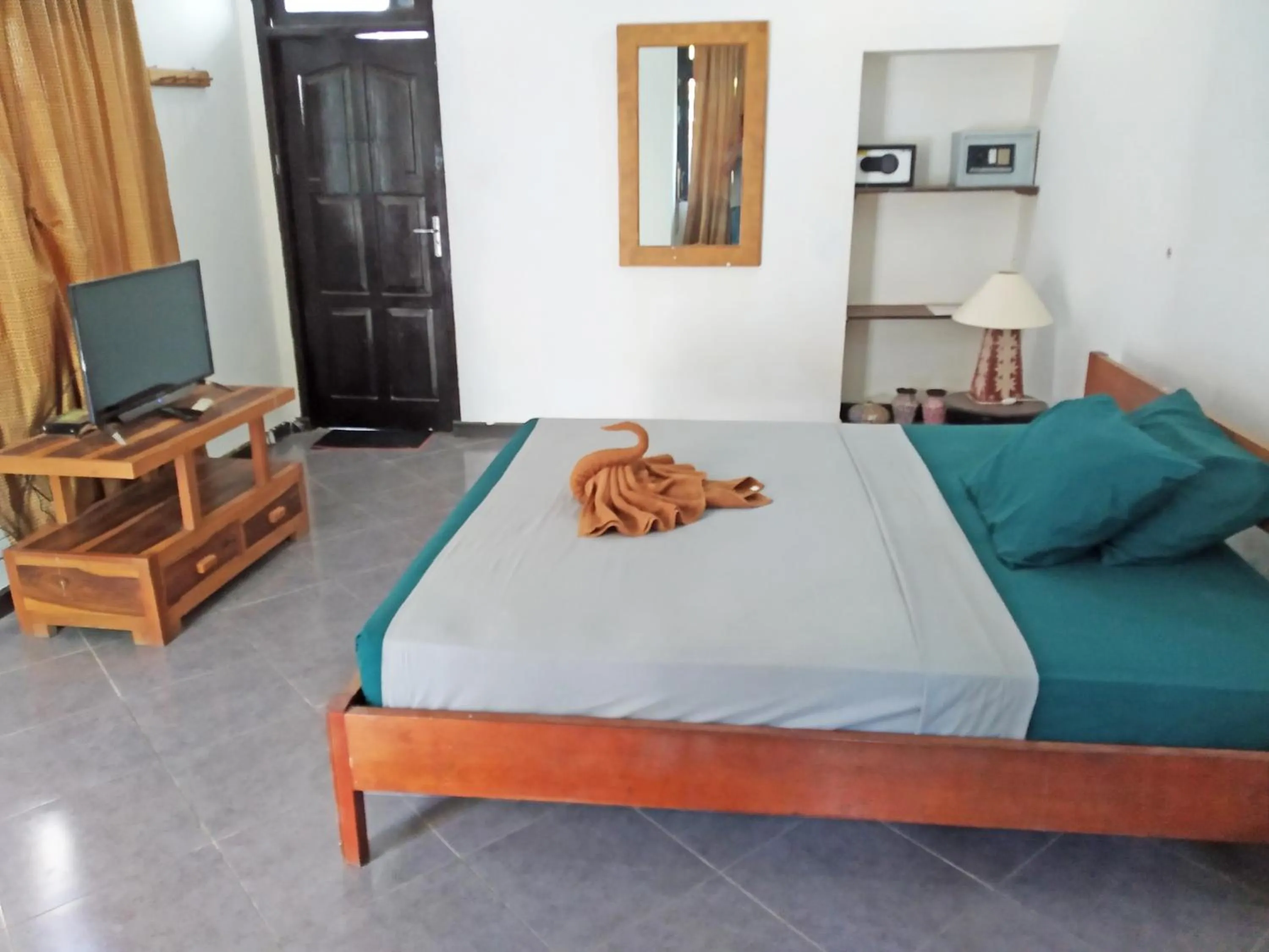 Bed in Gili Welldone Guesthouse