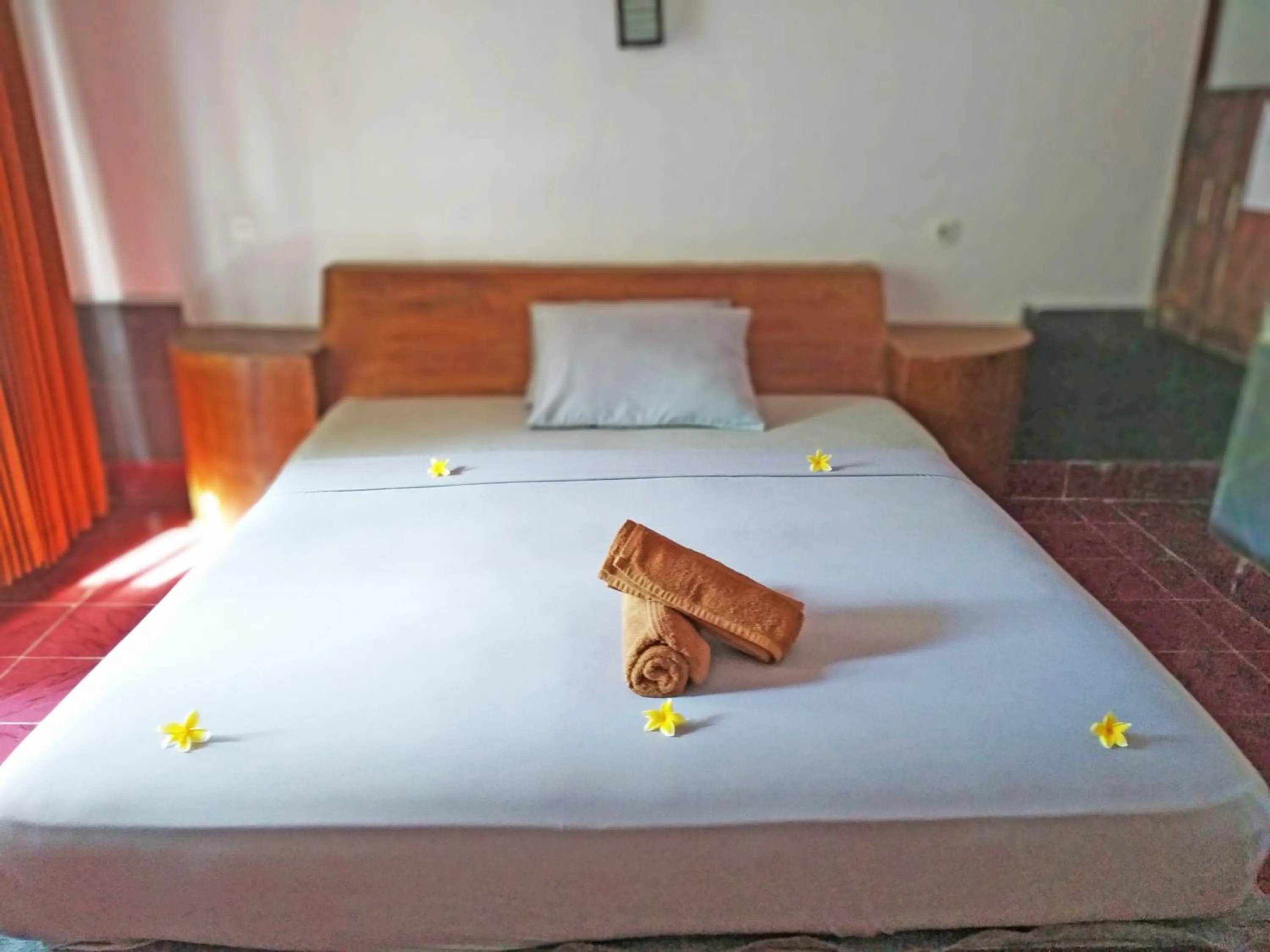 Bed in Gili Welldone Guesthouse