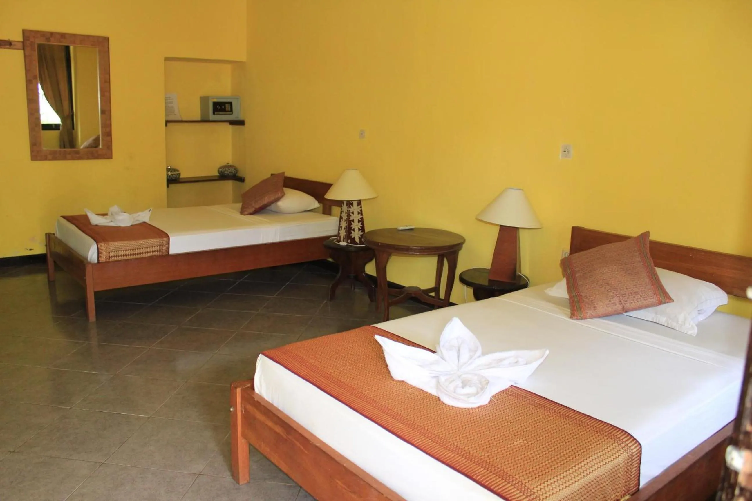 Bed in Gili Welldone Guesthouse