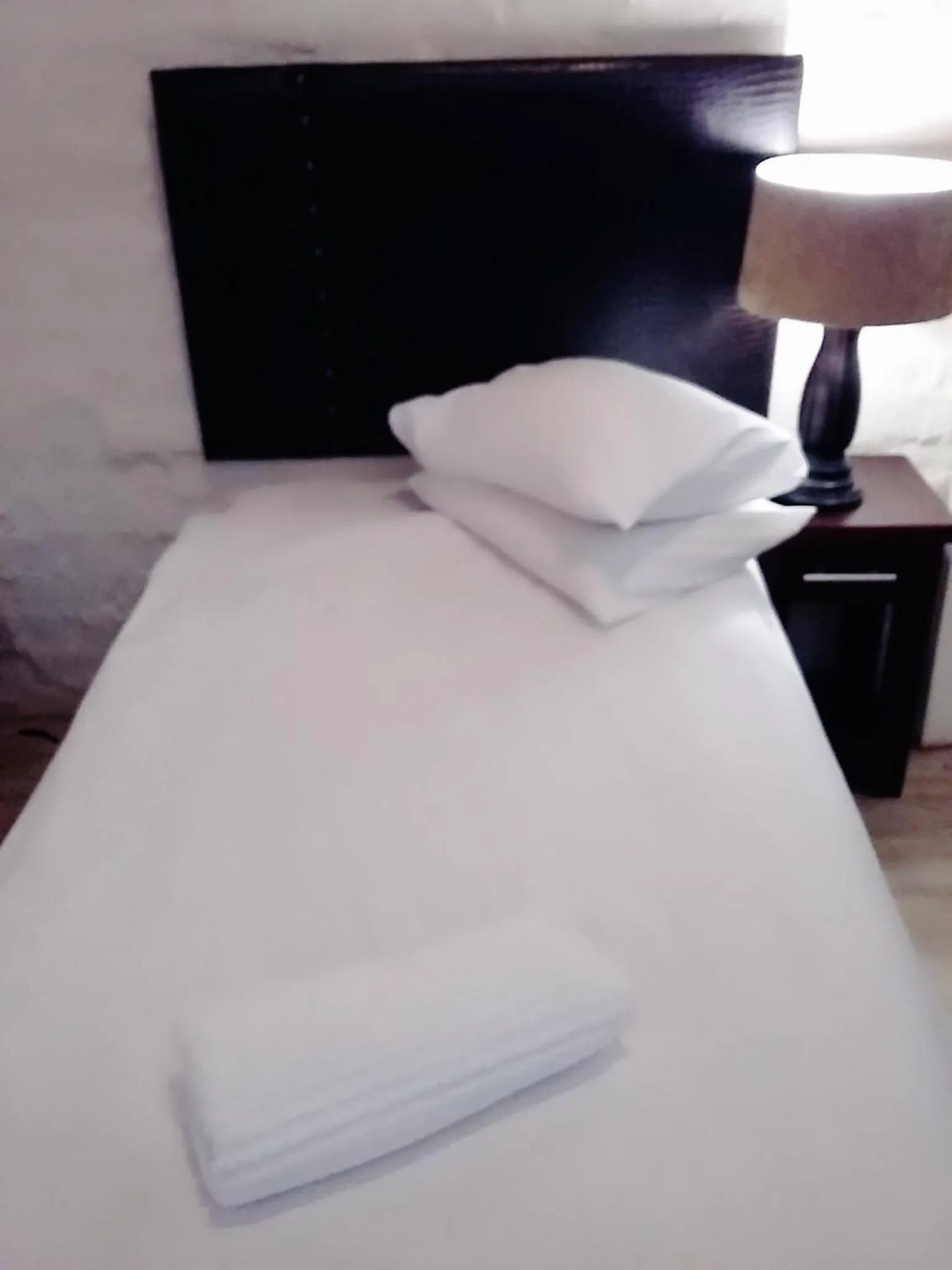 Bed in Bains Lodge - Sustainable Electricity