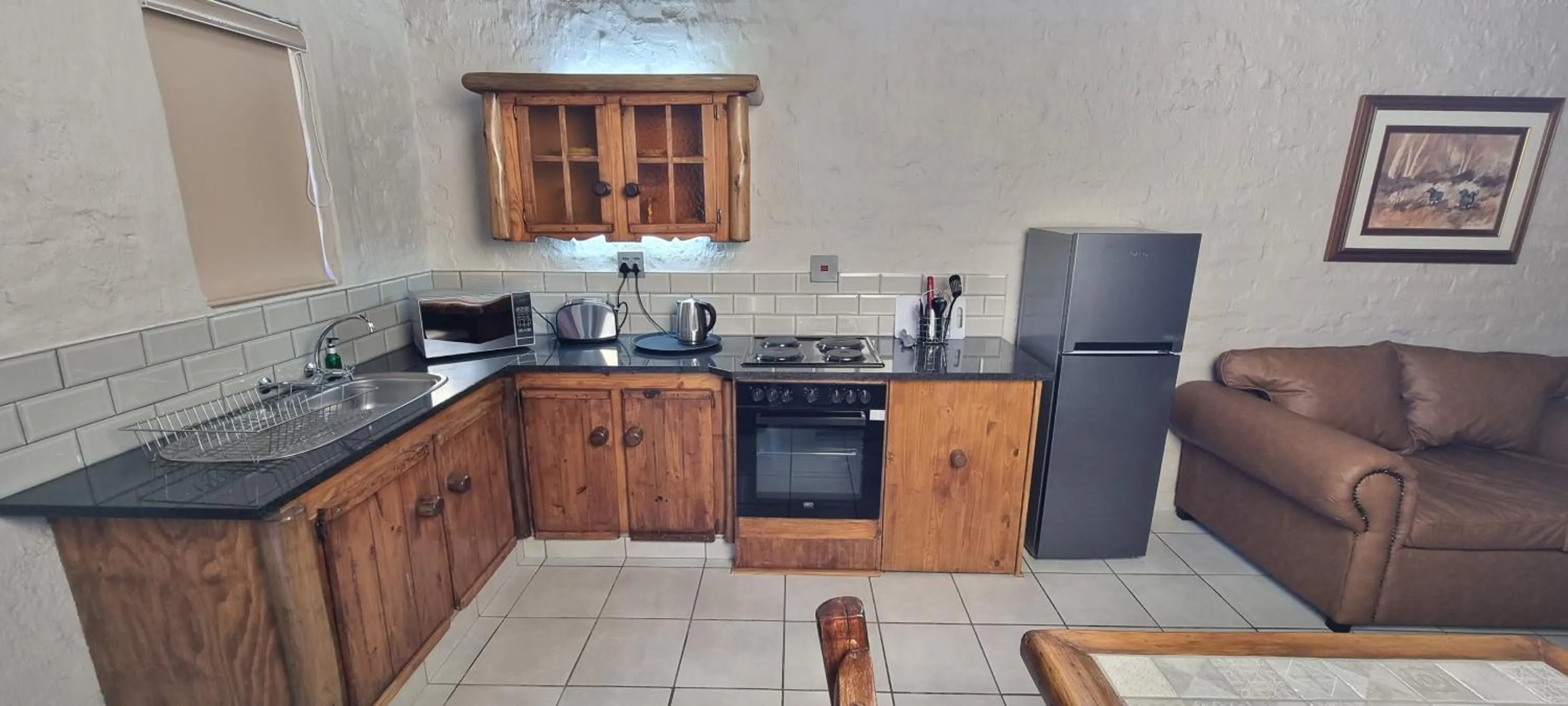 Kitchen or kitchenette in Bains Lodge - Sustainable Electricity