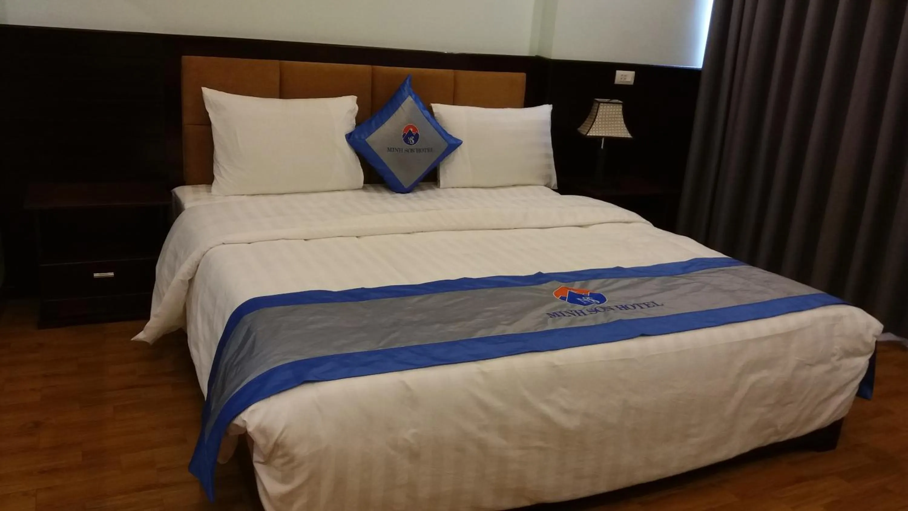 Bed in Minh Sơn HOTEL