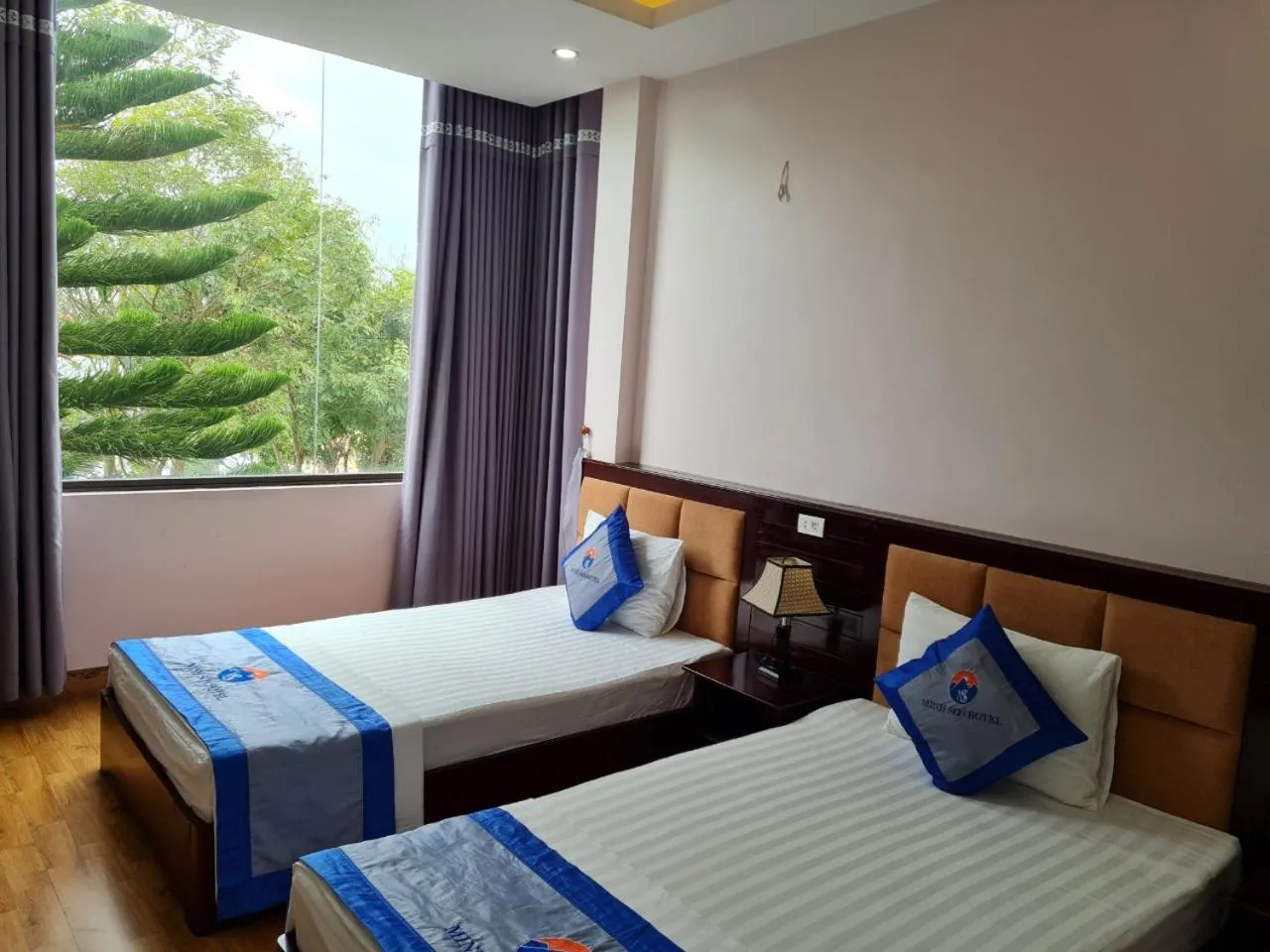 Bed in Minh Sơn HOTEL