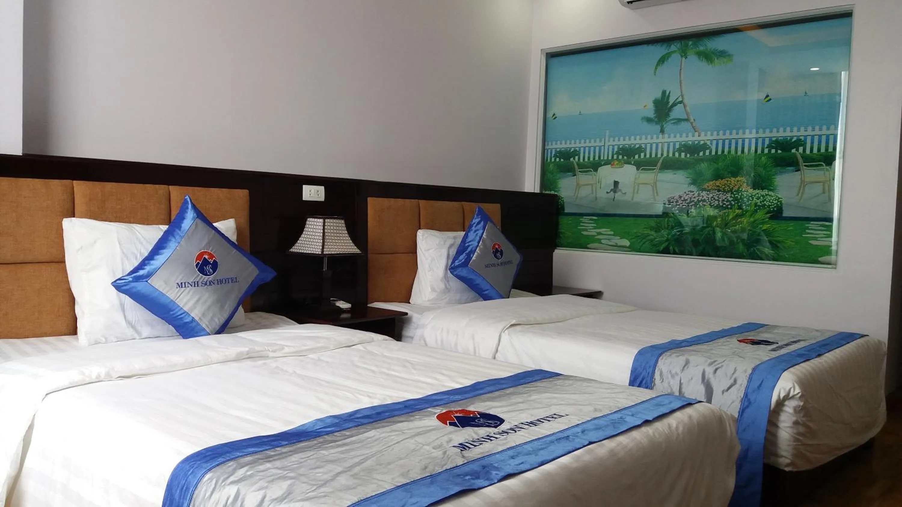 Bed in Minh Sơn HOTEL