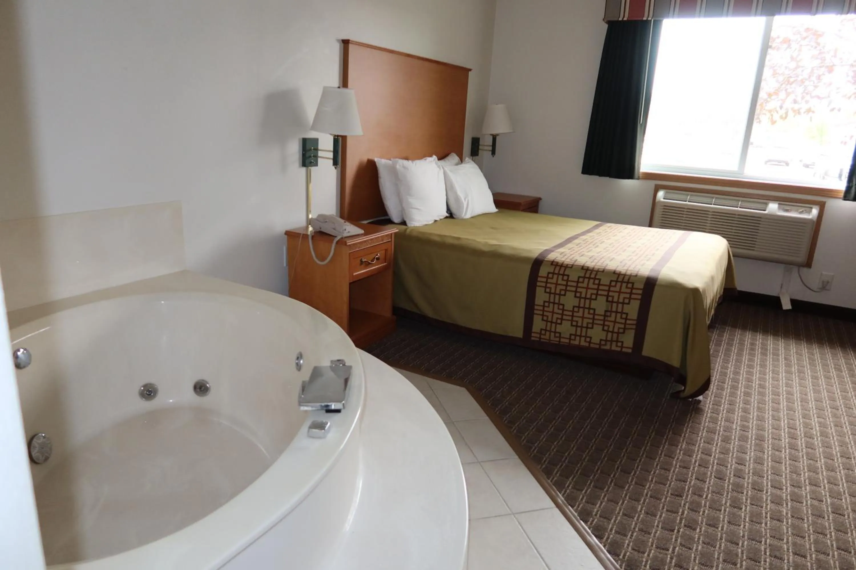 Bed in Americas Best Value Inn