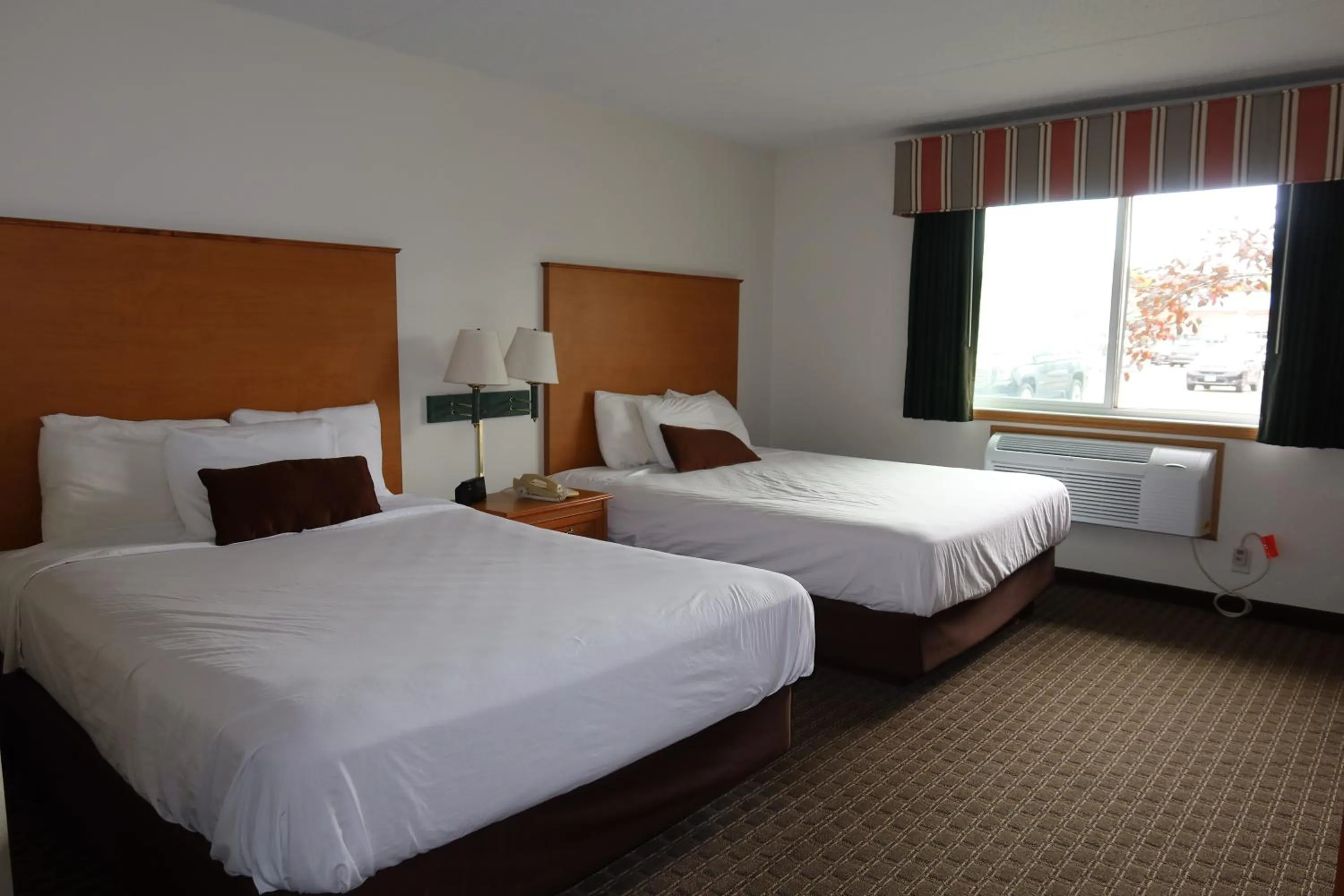 Bed in Americas Best Value Inn