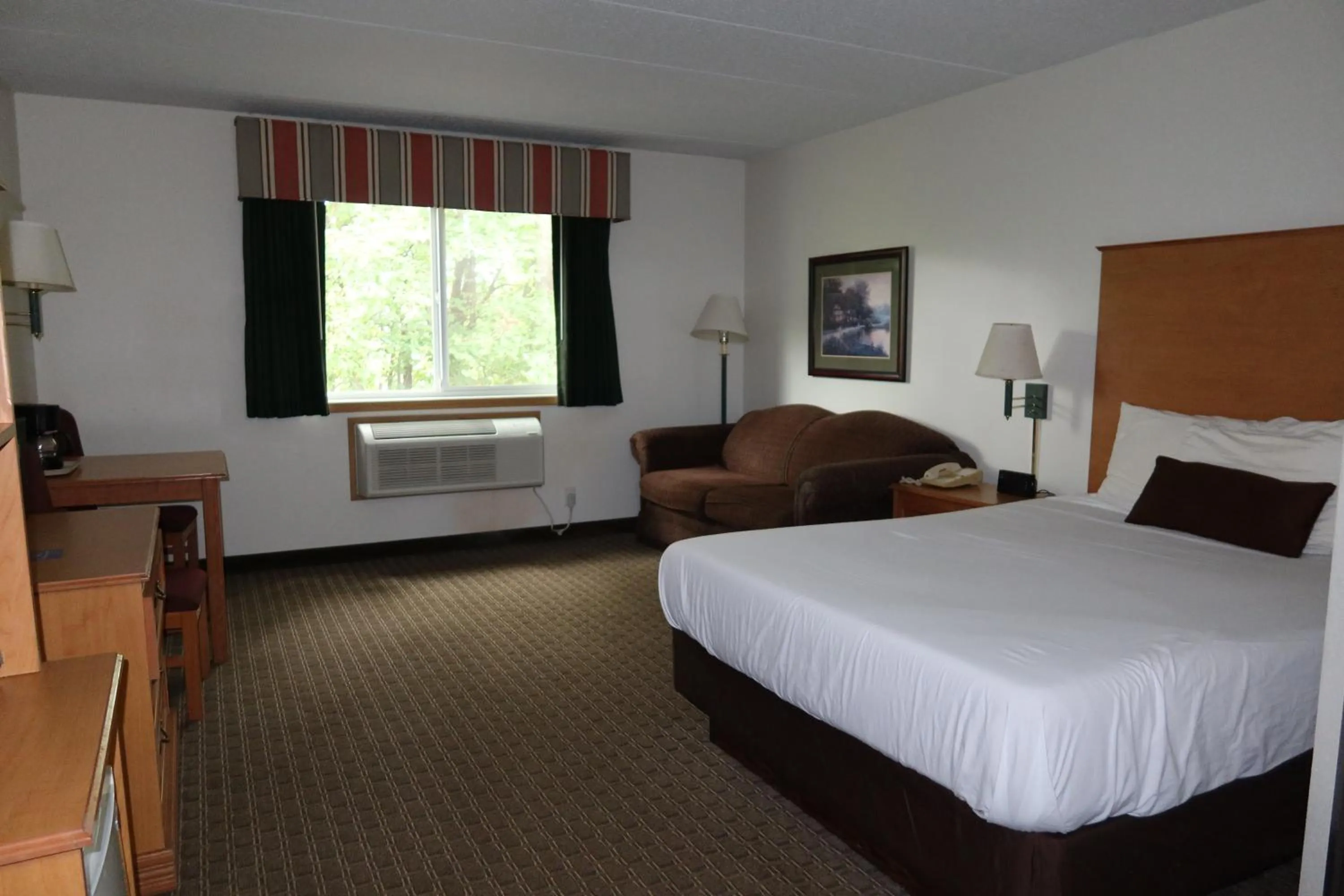 Bed in Americas Best Value Inn