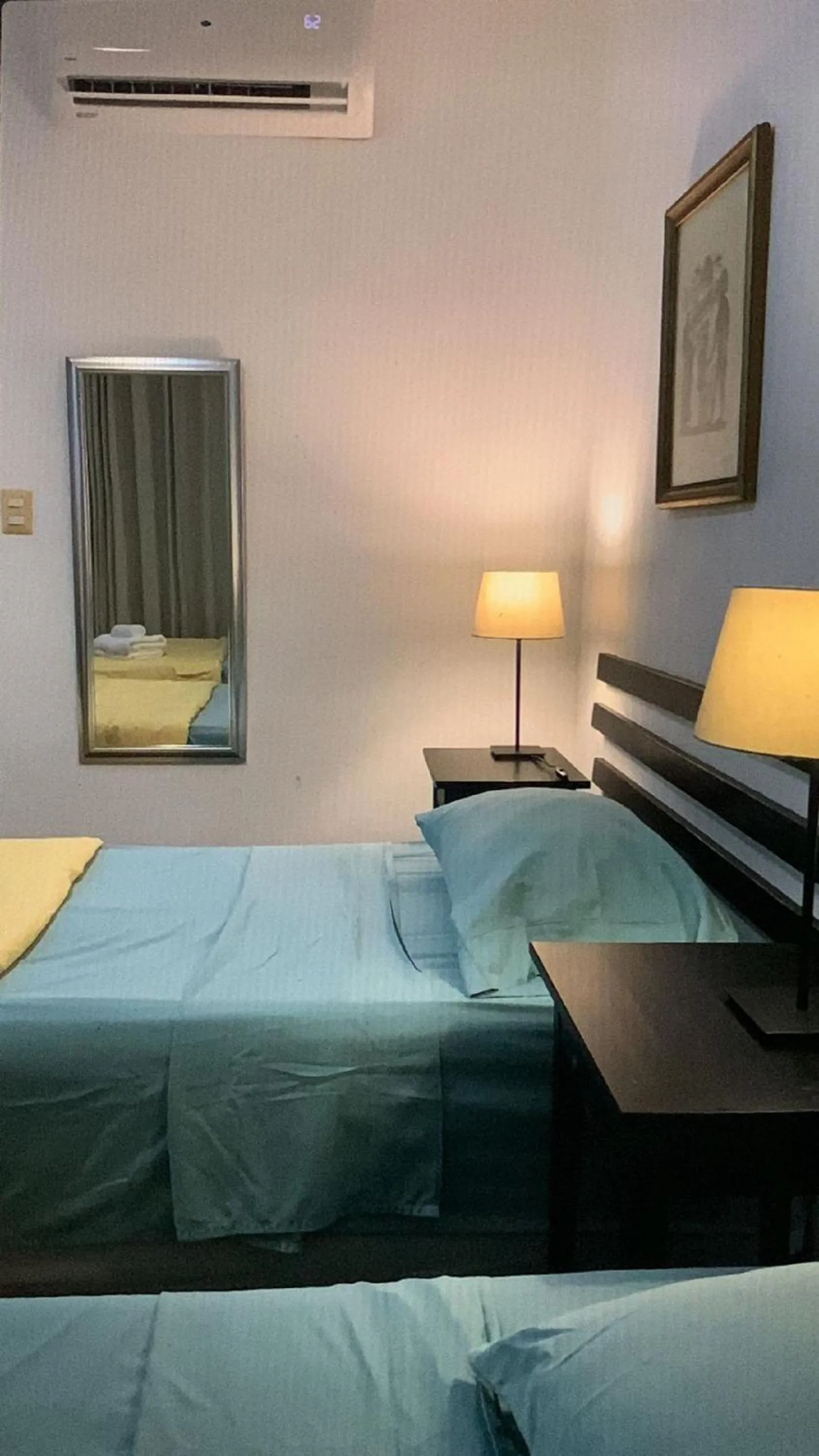 Bed in Manaya Bed & Breakfast