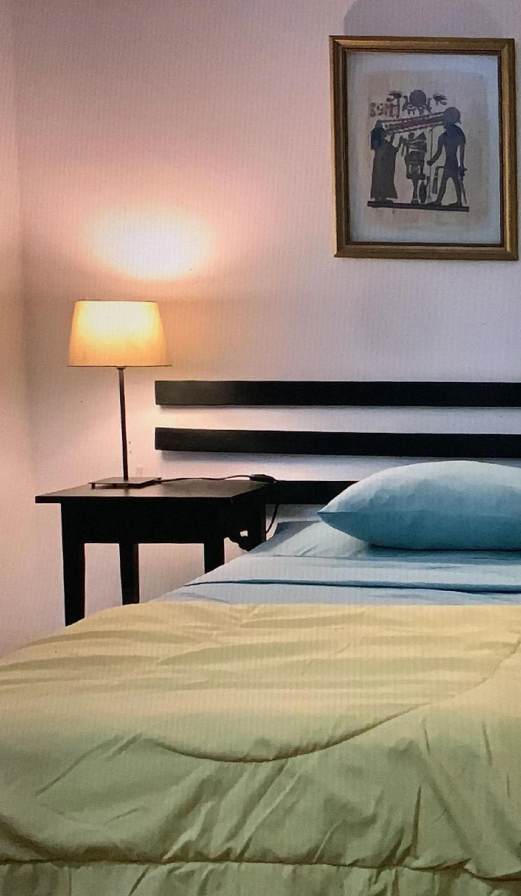 Bed in Manaya Bed & Breakfast