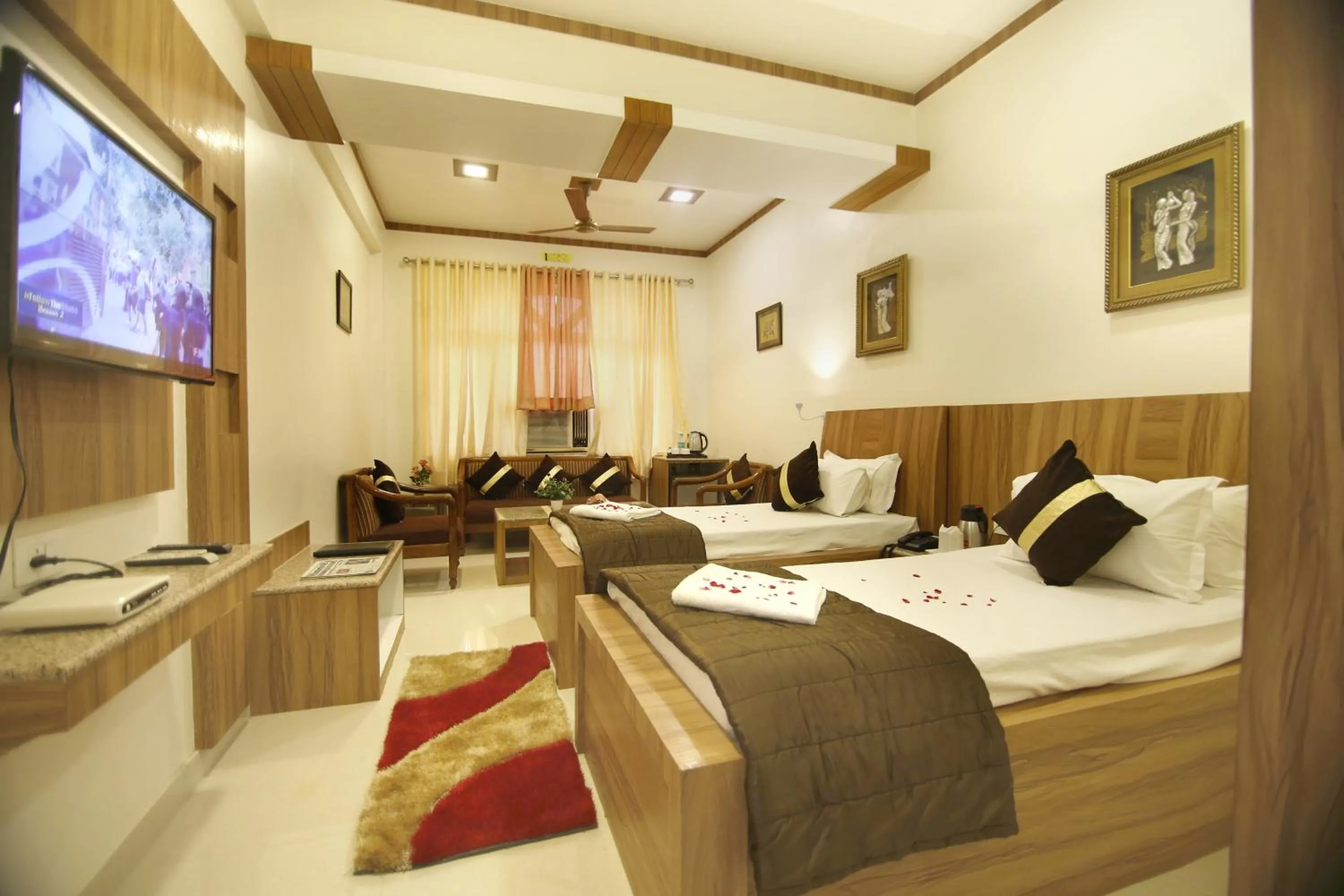 Bedroom, Bed in Hotel Sheetal Regency,Near Janambhumi