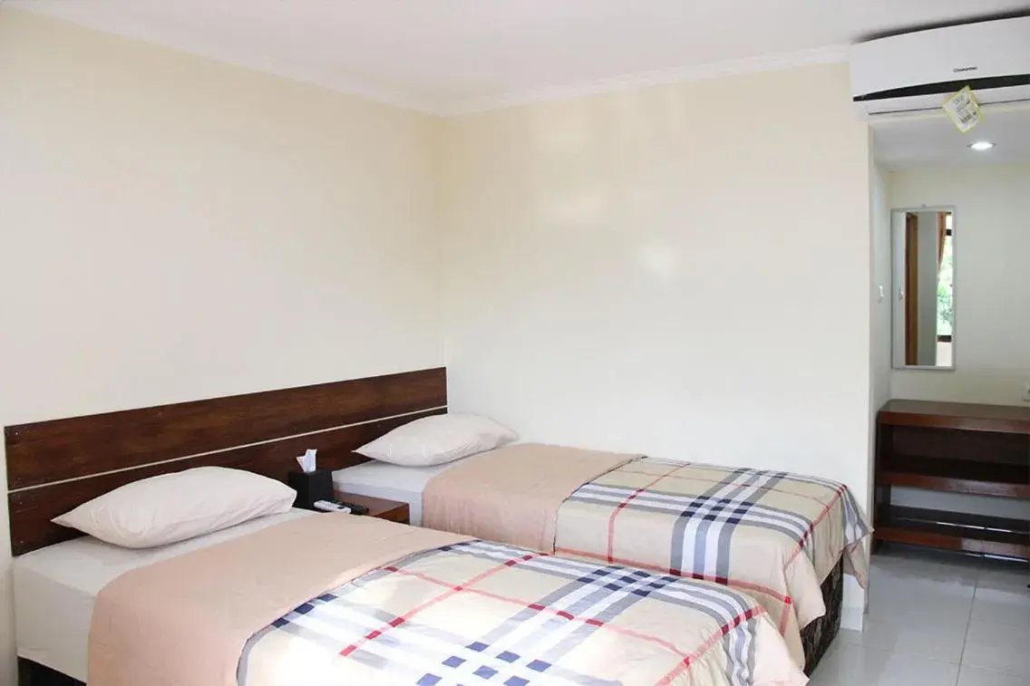 Standard Twin Room in Bamboe Inn Homestay Standard Twin Room in Bamboe Inn Homestay