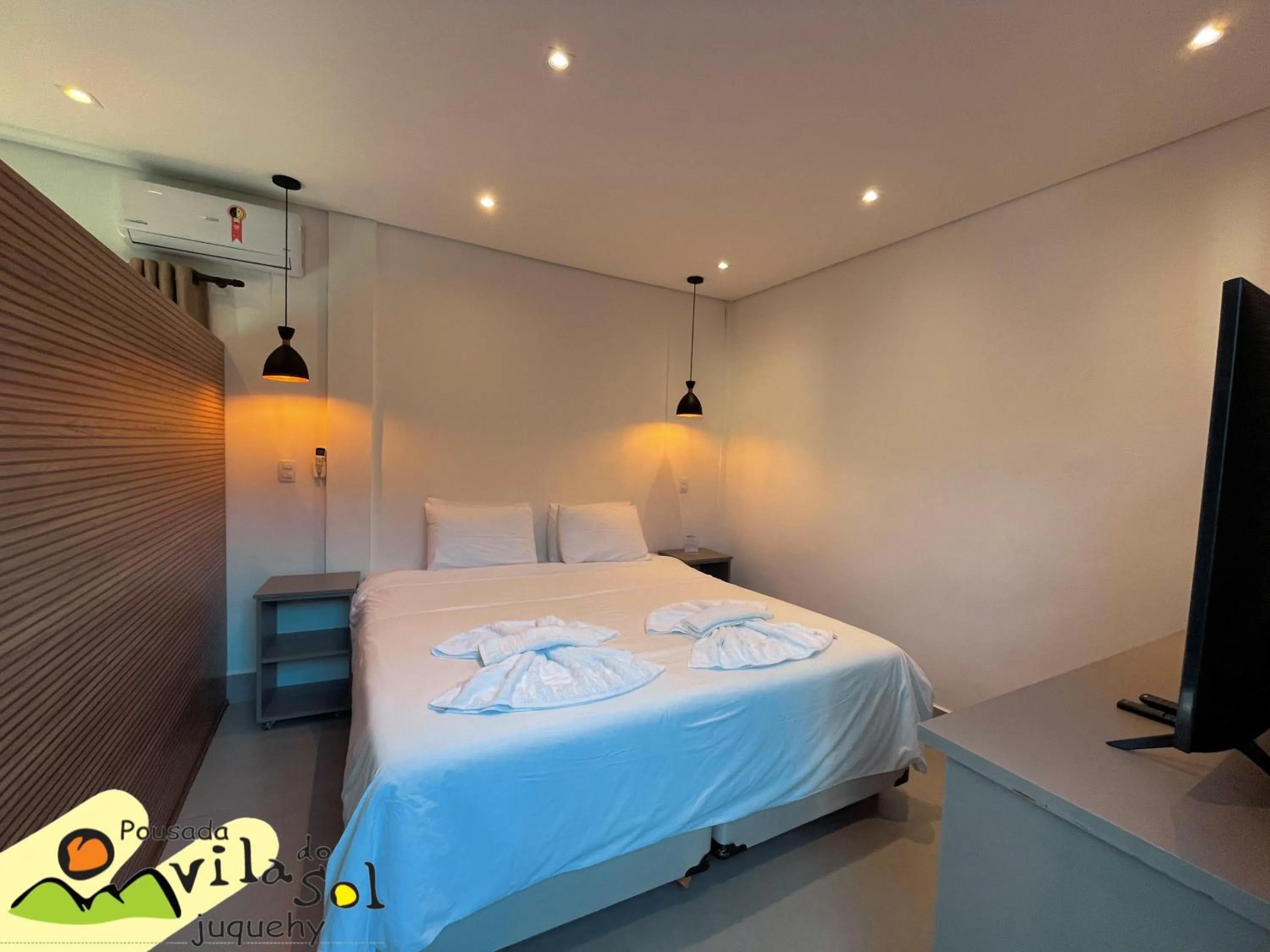 Bed in Pousada Vila do Sol Juquehy