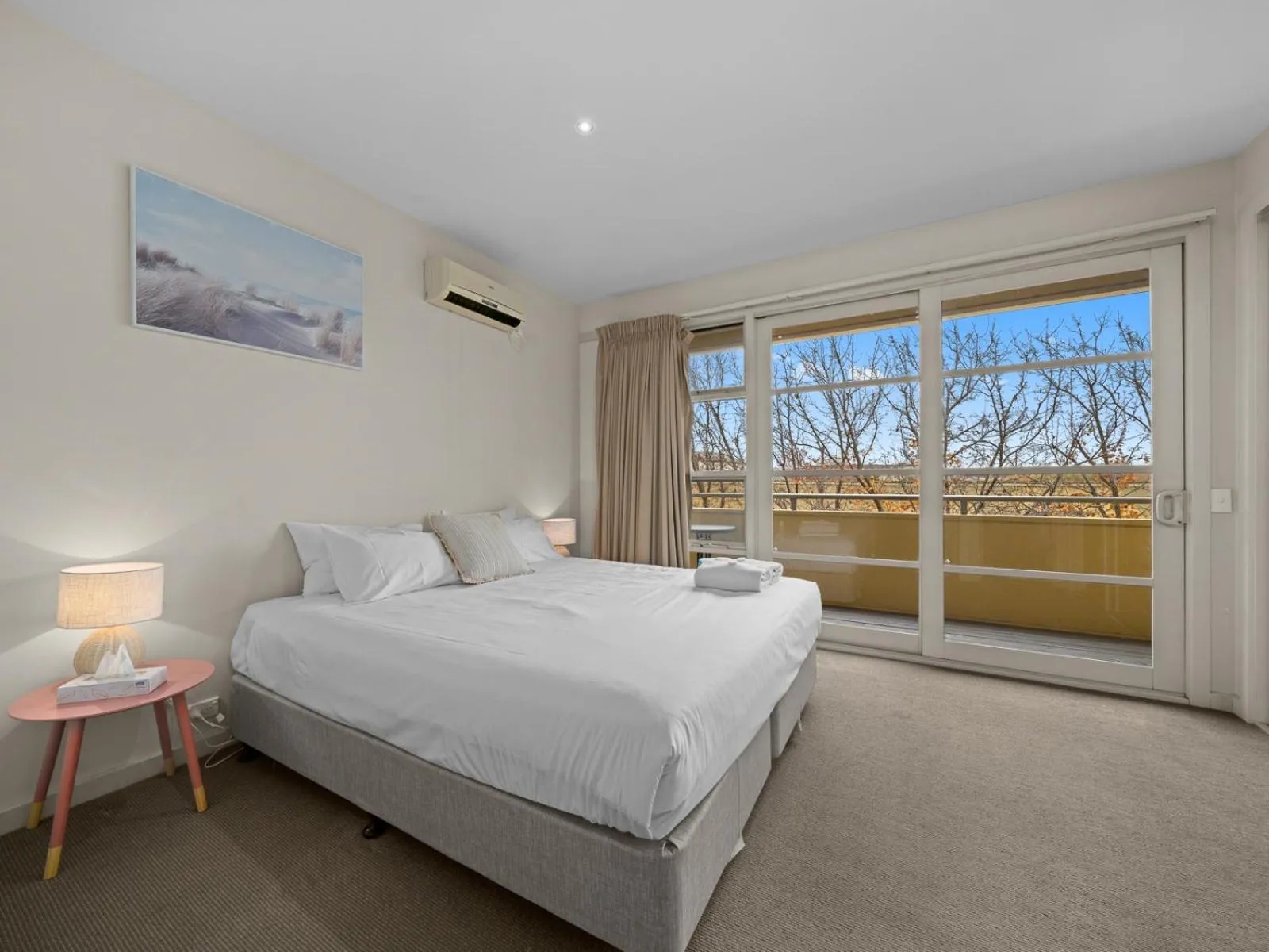 Bed in Central Shepparton Apartments