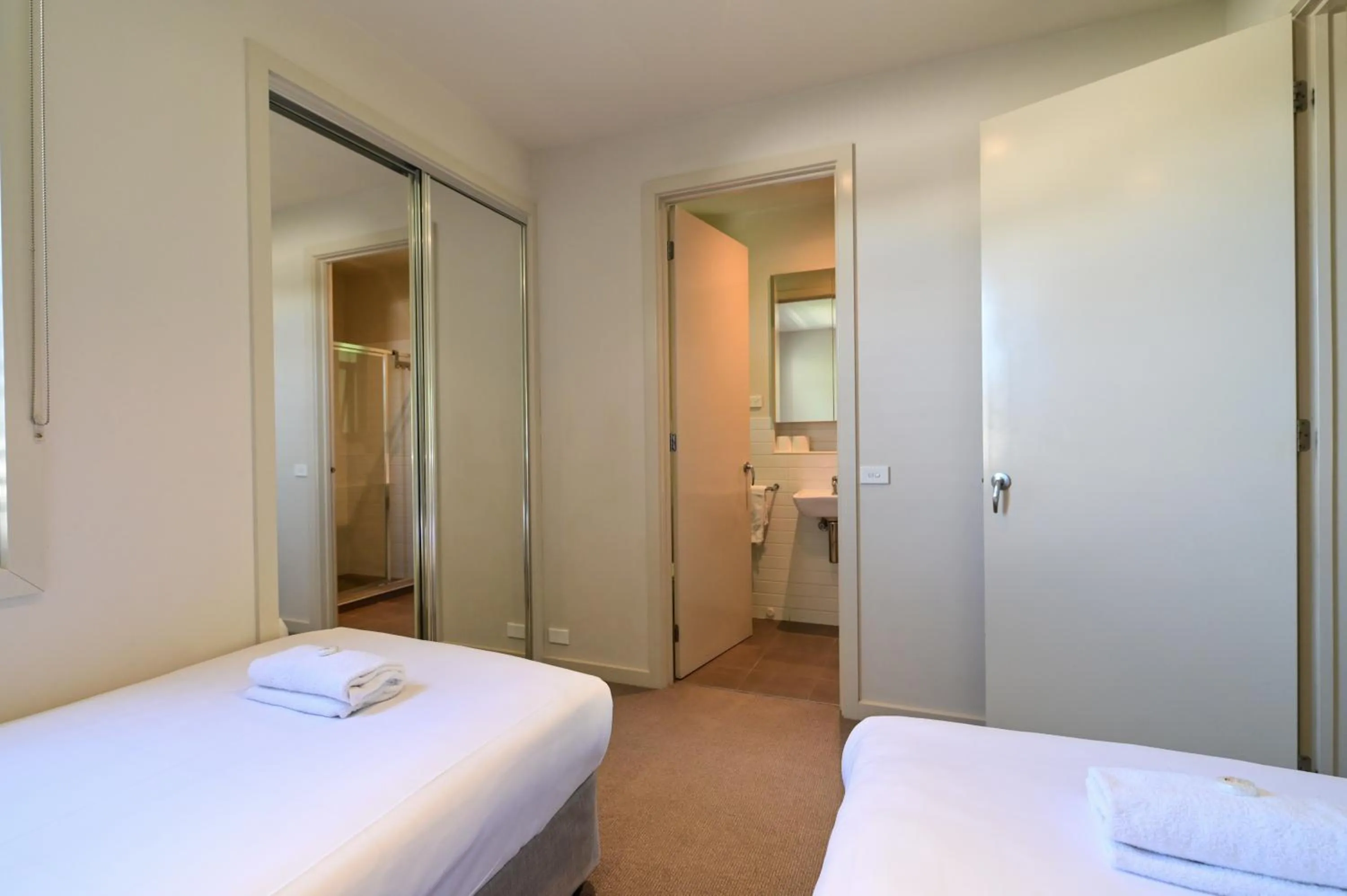 Bed in Central Shepparton Apartments