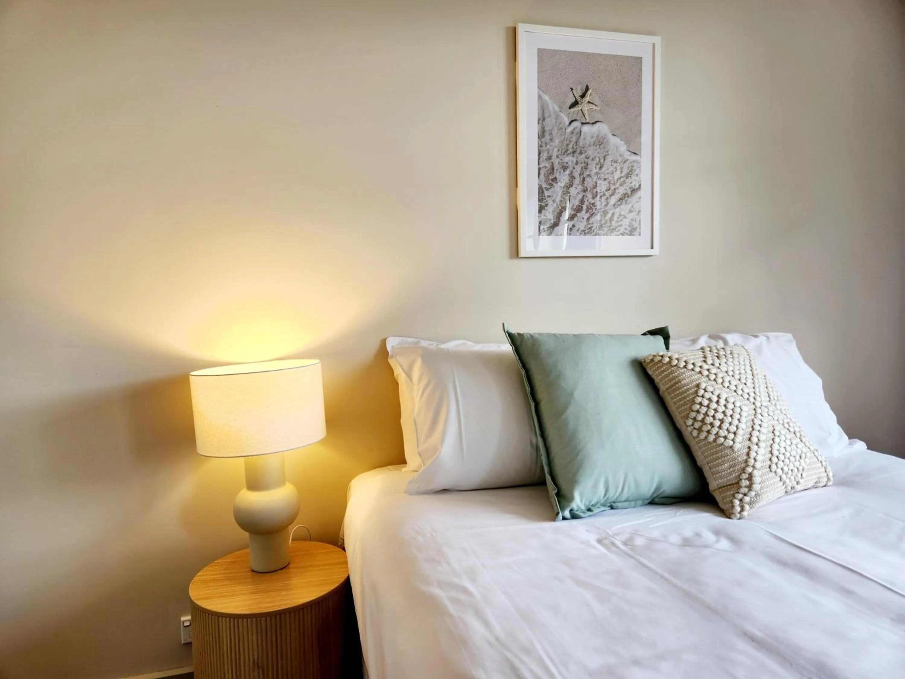 Bed in Central Shepparton Apartments