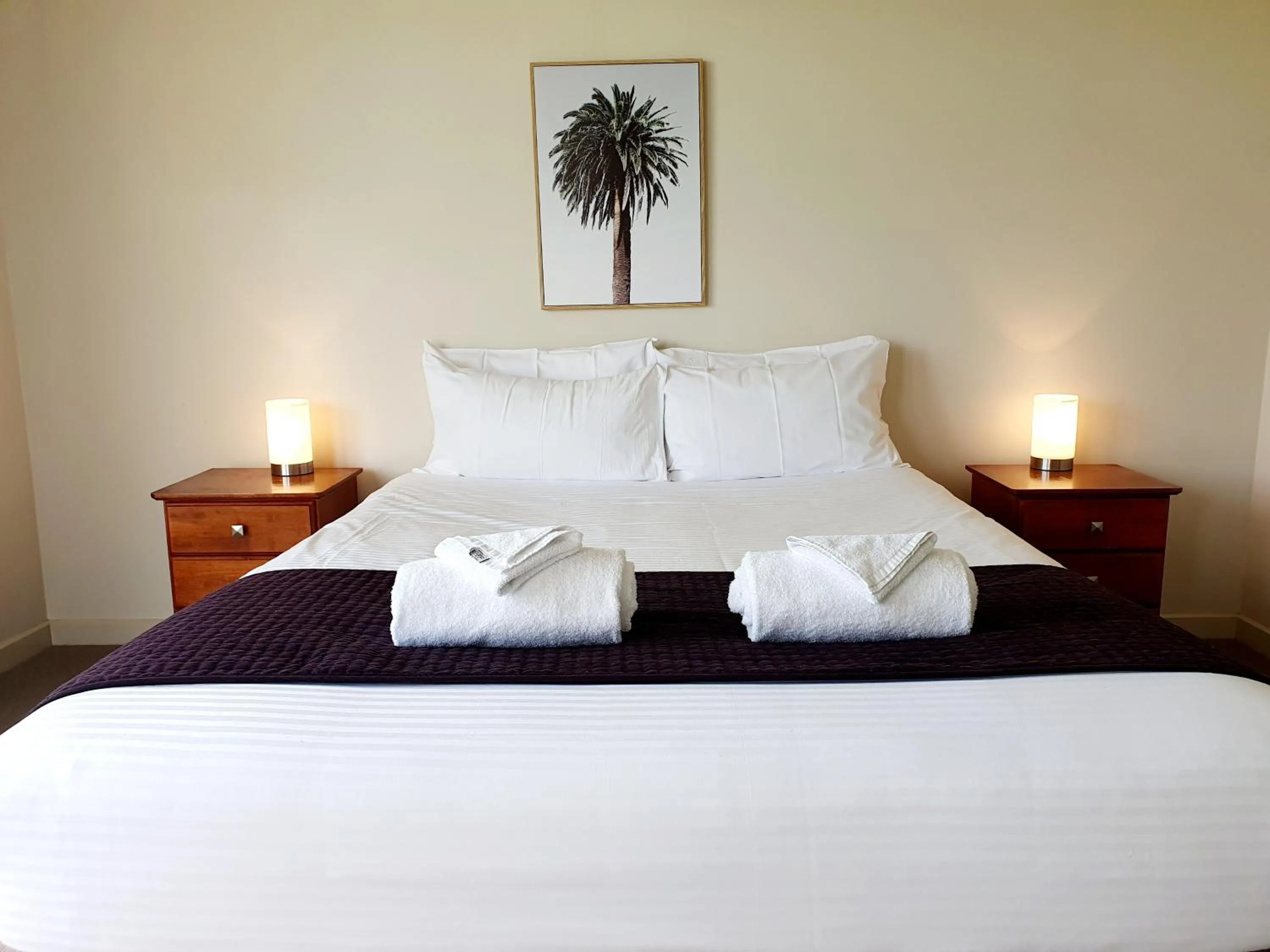 Bed in Central Shepparton Apartments