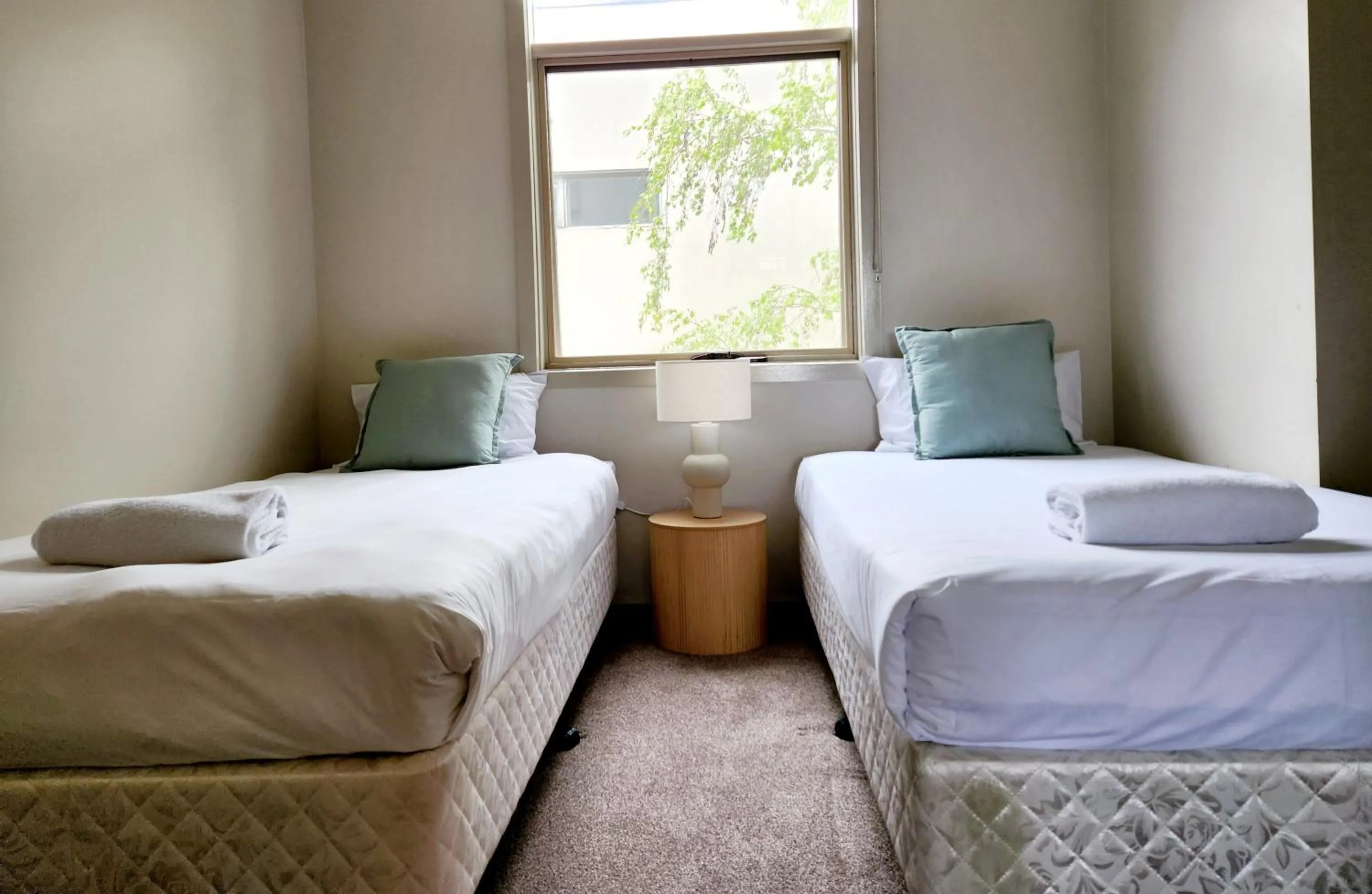 Bed in Central Shepparton Apartments