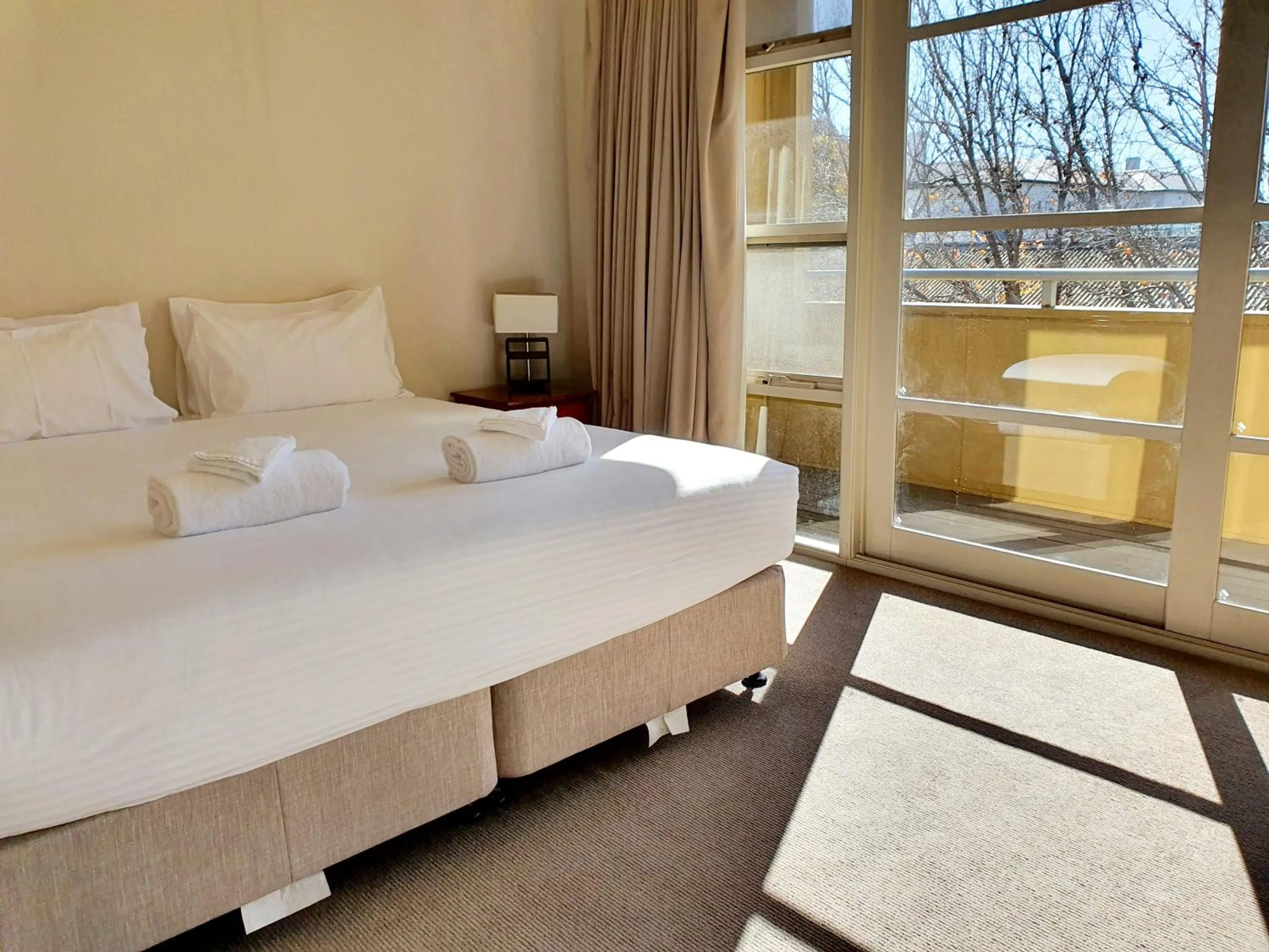 Bed in Central Shepparton Apartments