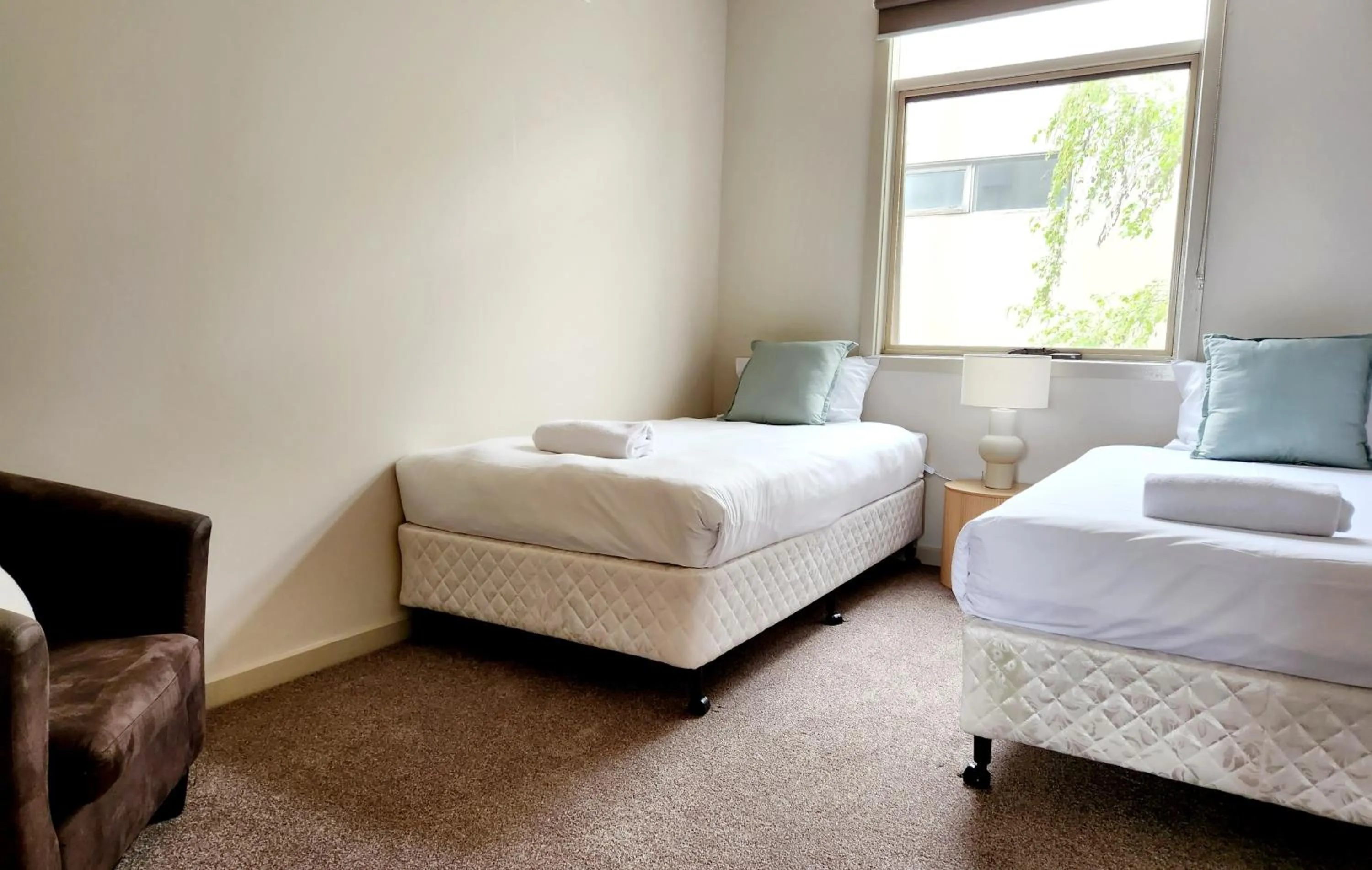 Bed in Central Shepparton Apartments