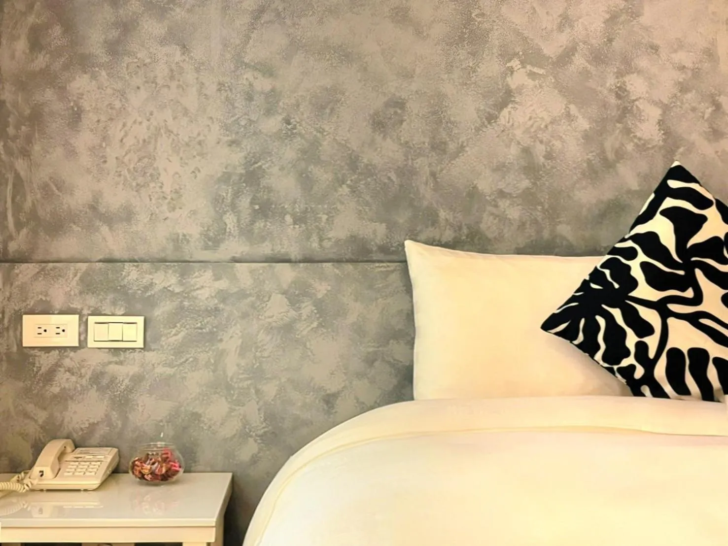 Bed in Wemeet Hotel Taipei