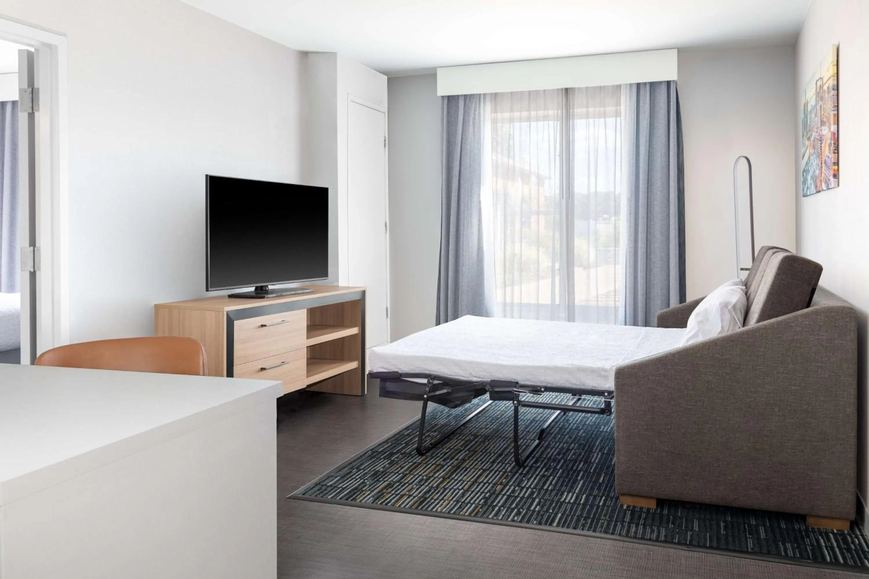 Living room, Bed in Homewood Suites by Hilton Detroit-Troy