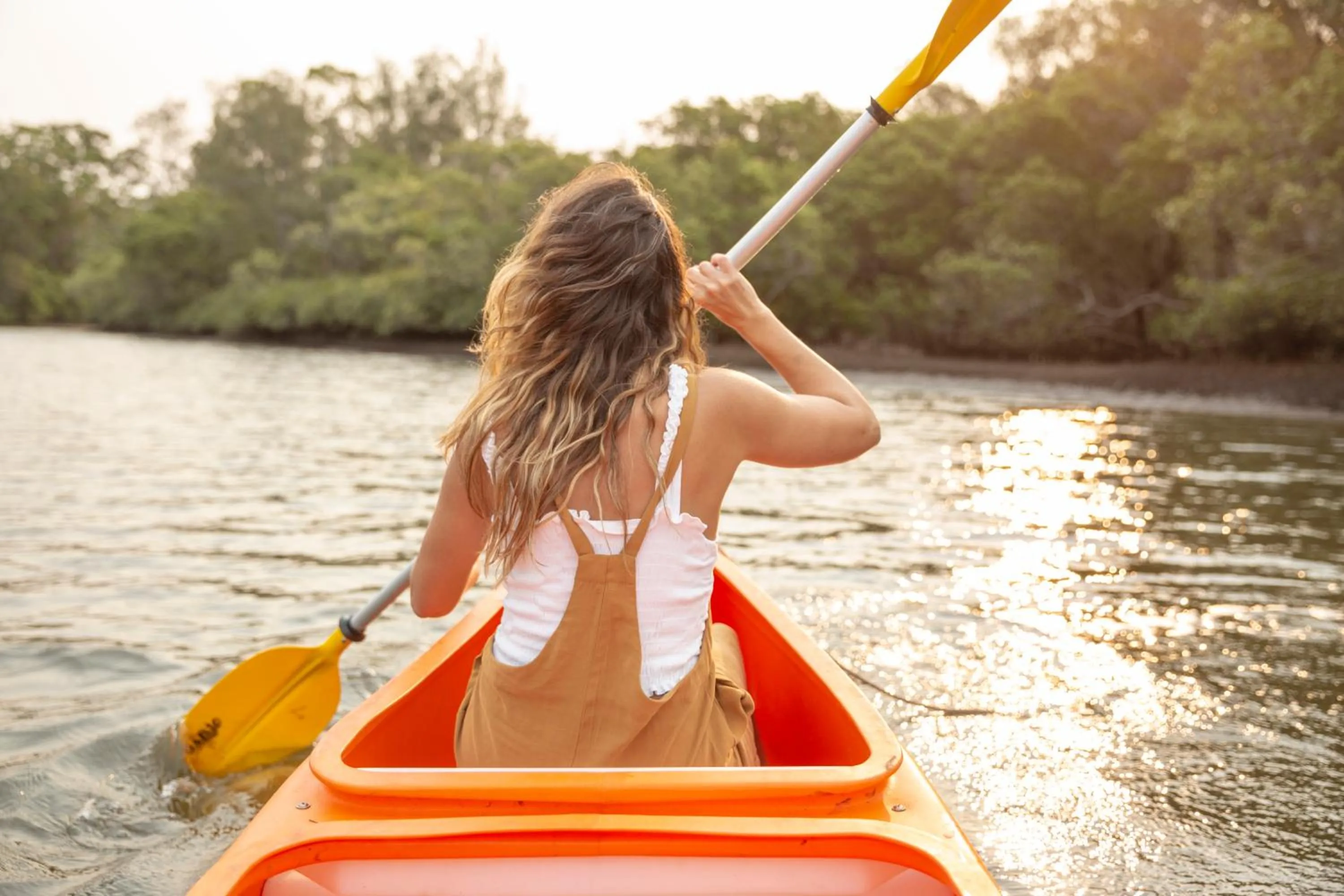 Canoeing in Paperbark Camp