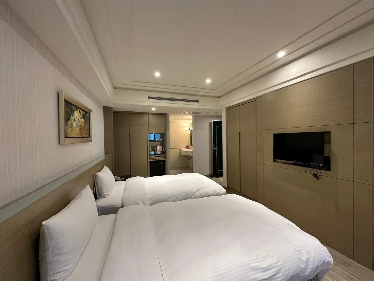 Bed in Link World Hotel