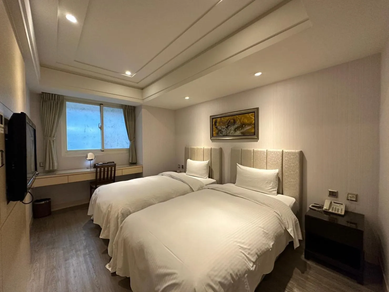 Bed in Link World Hotel