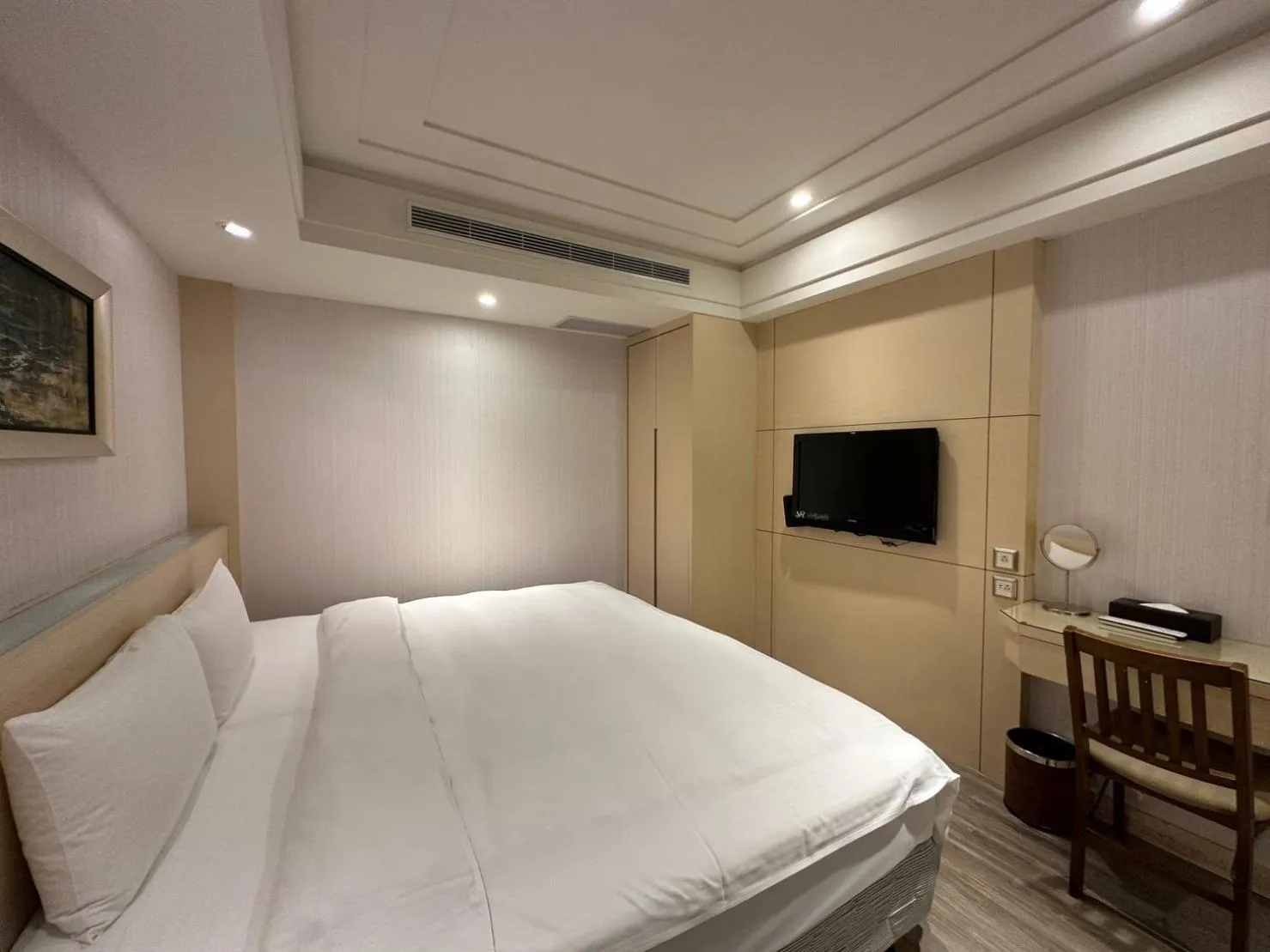 Bed in Link World Hotel