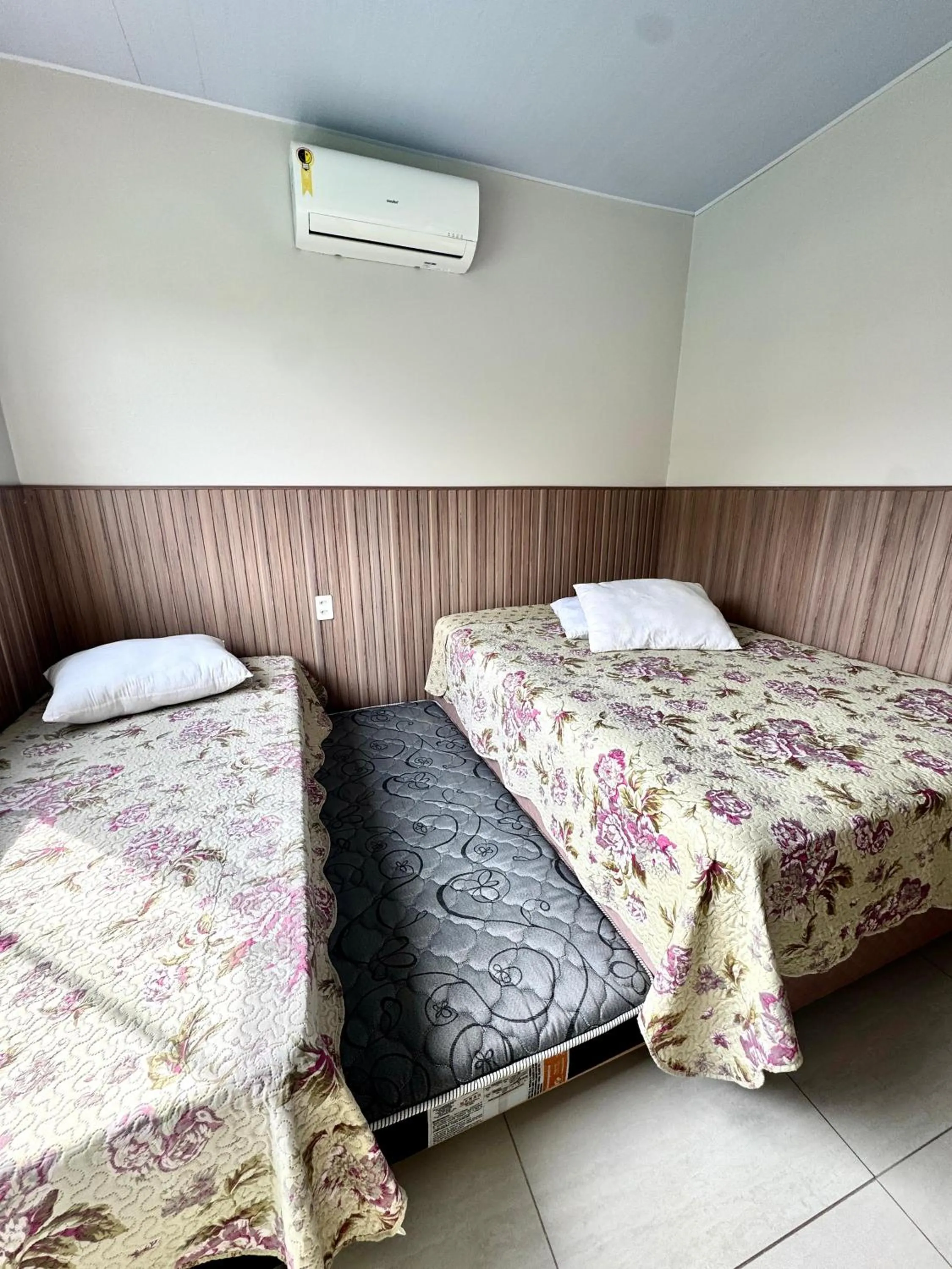 Bed in Pousada Massiambu