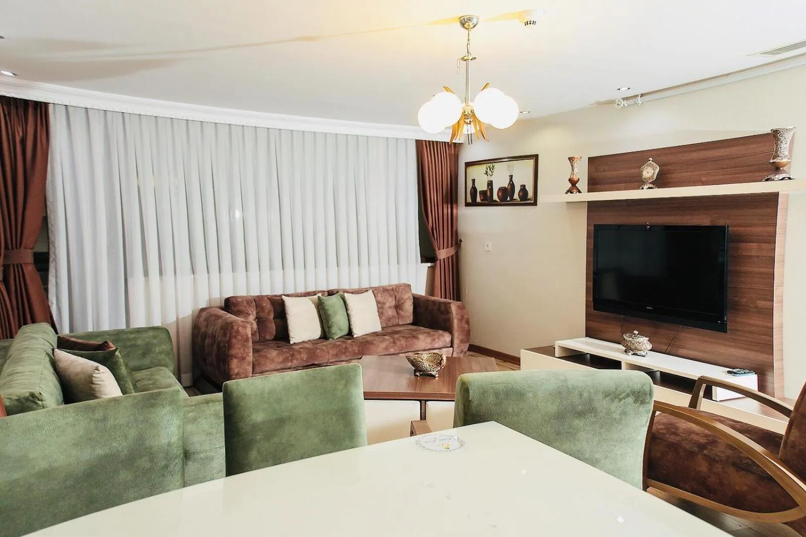 Communal lounge/ TV room in Golf Royal Residence