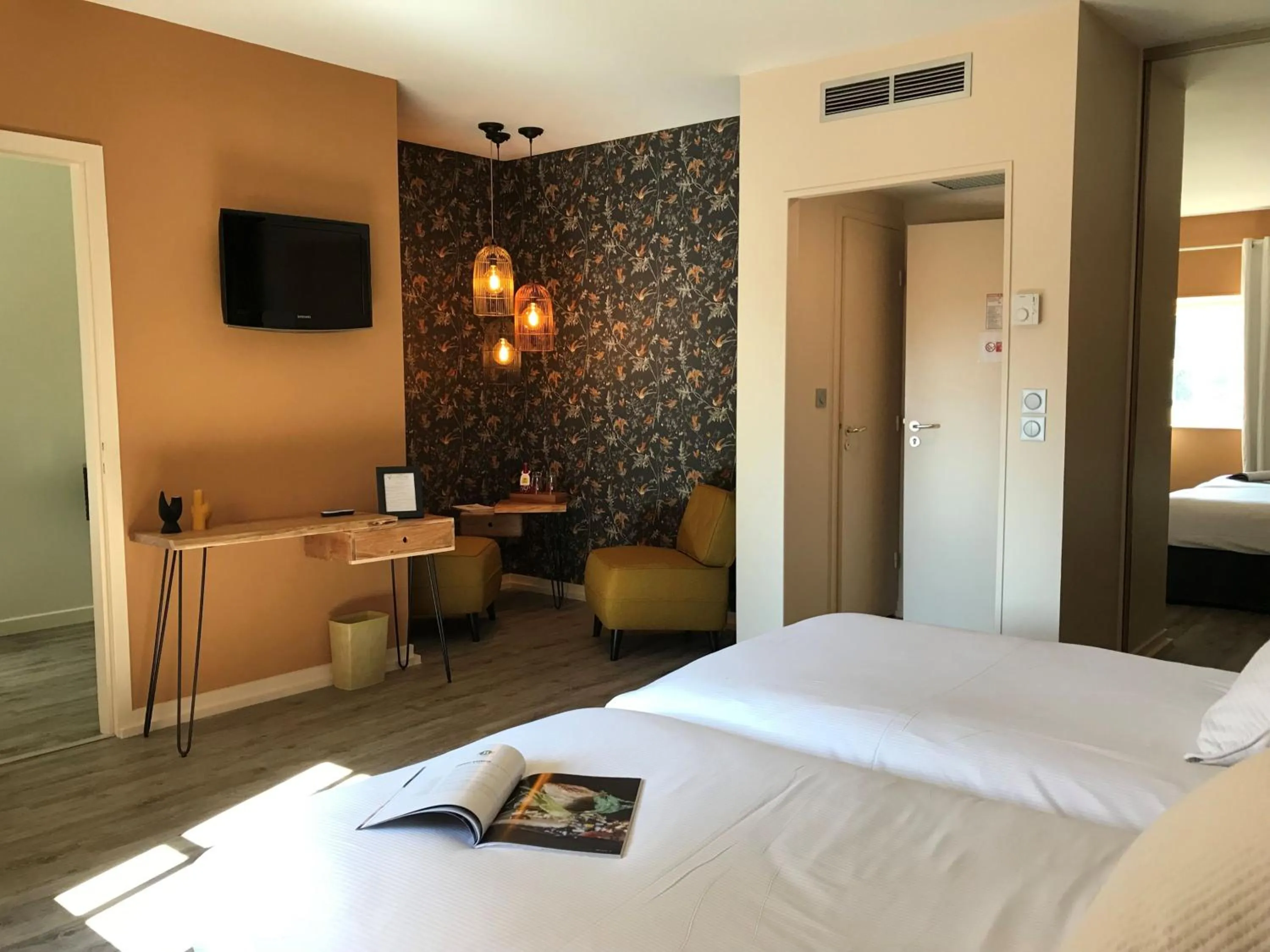 Seating area, Bed in Demeures et Chateaux l'Abbaye Caladoise - Anciennement Hostellerie Ferme du Poulet