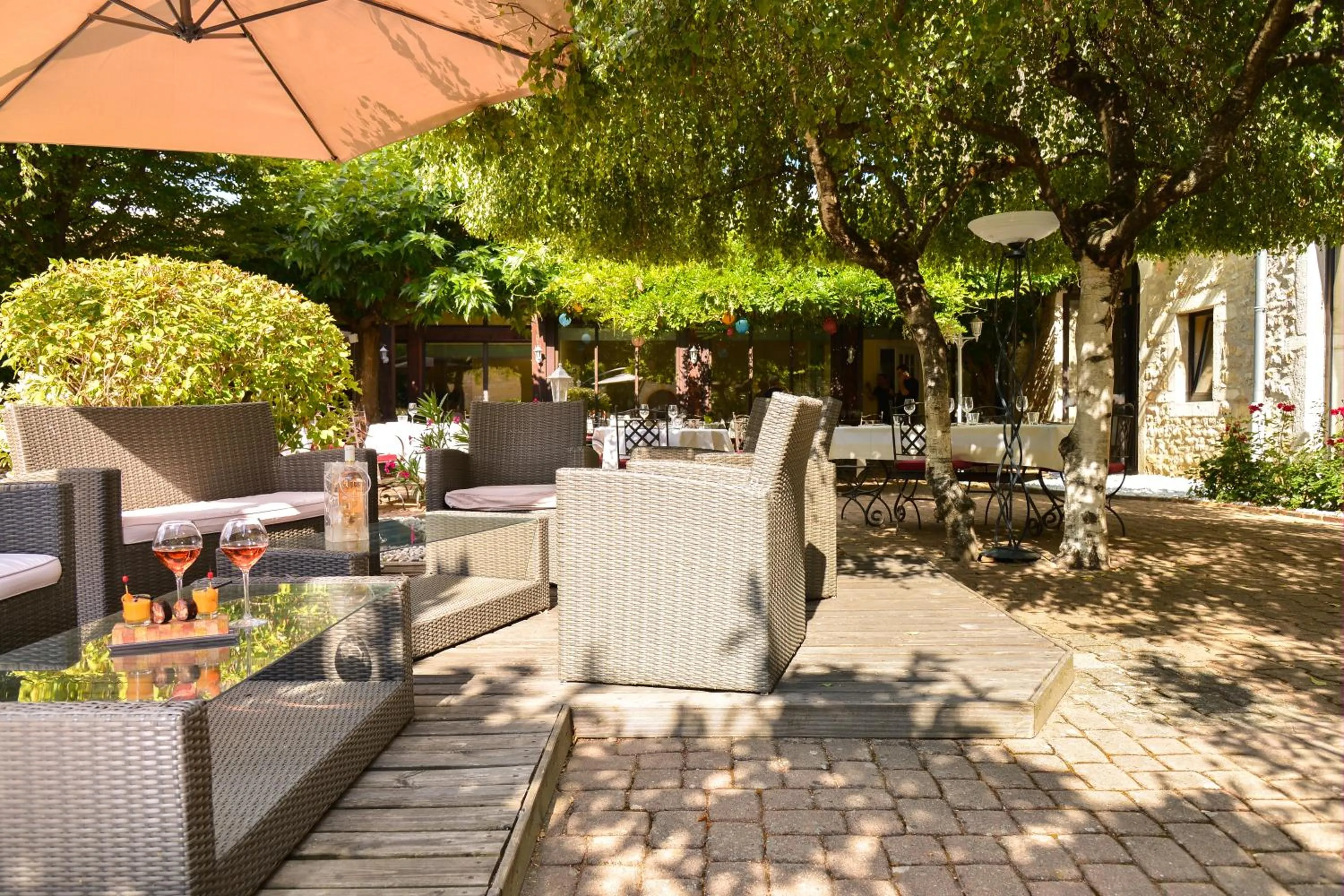 Patio in Demeures et Chateaux l'Abbaye Caladoise - Anciennement Hostellerie Ferme du Poulet