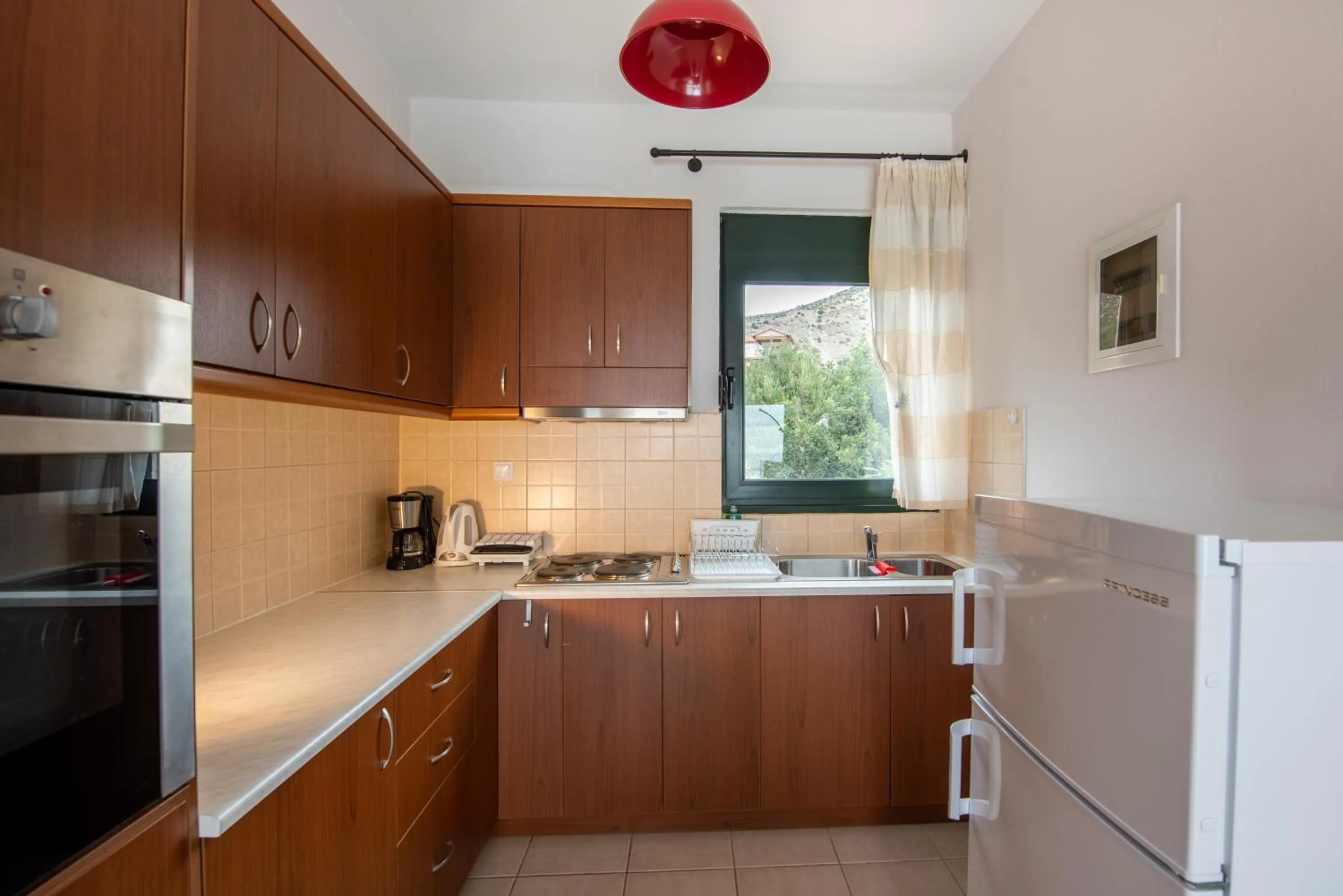 Kitchen or kitchenette in Portela Suites Kastri